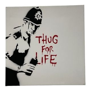 Banksy, Thug For Life, Spray Paint on Canvas: Original Banksy stencil artwork depicting a British police officer beside the graffiti phrase “Thug for Life” rendered in dripping red lettering. Executed in a monochrome spray paint 
