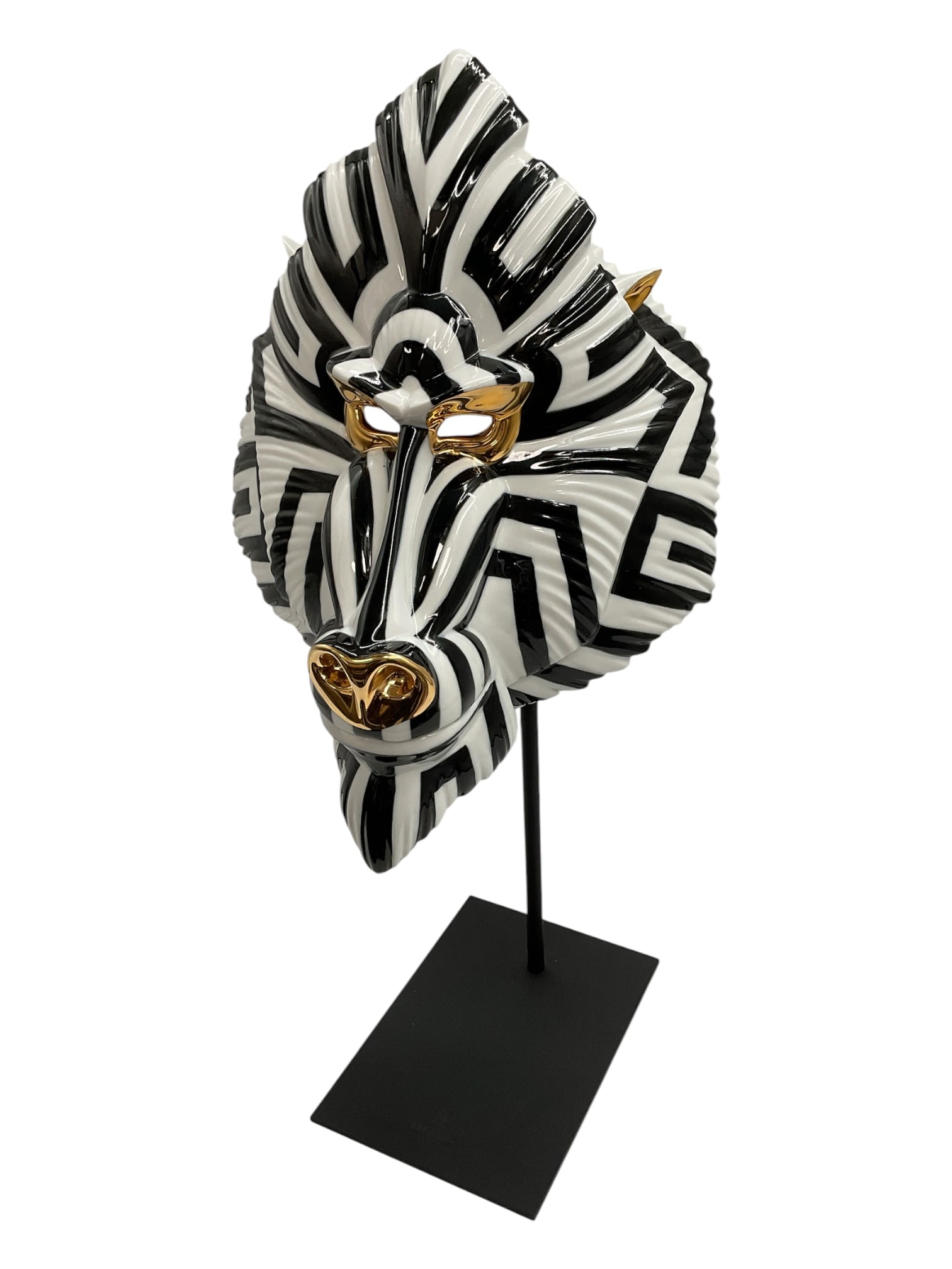 "Mandrill Mask" by Lladró (Spain, 1953-) Porcelain: This contemporary porcelain sculpture is part of the Fierce Portraits collection, depicting a mandrill with bold graphic black-and-white linear patterns across its stylized facial structure. Hand-appl