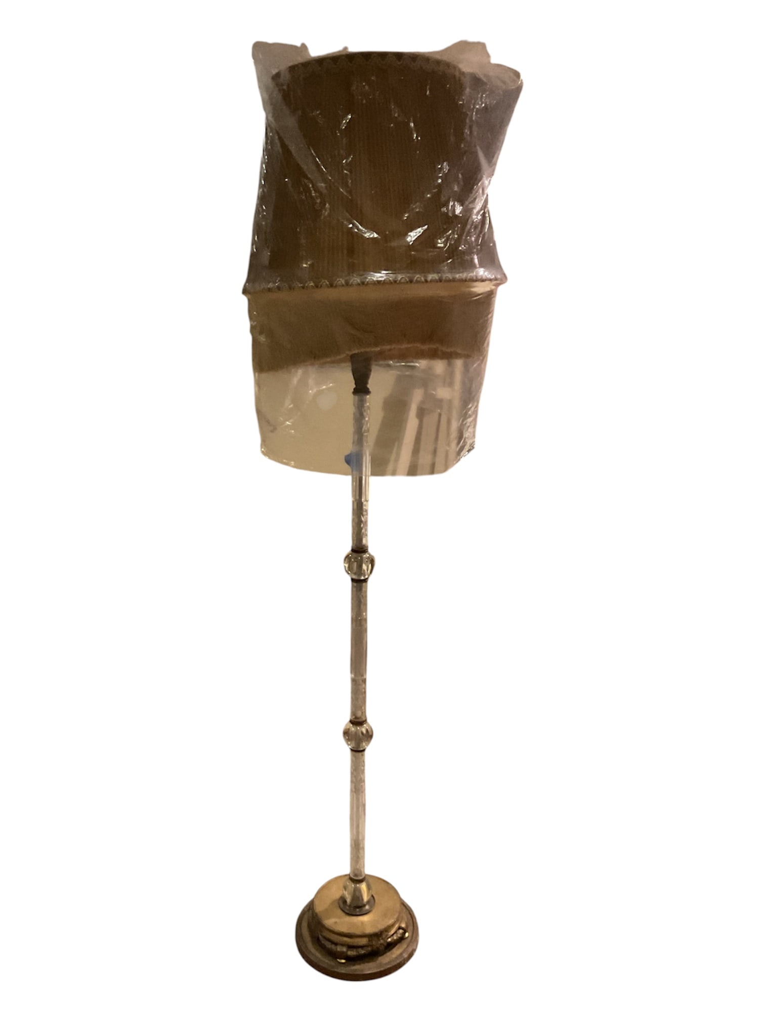 Crystal and Brass Floor Lamp with Pleated Shade: Tall traditional floor lamp featuring a segmented clear crystal column with faceted sections and spherical crystal nodes separated by brass-tone fittings. Raised on an ornate circular gilt and bronze-