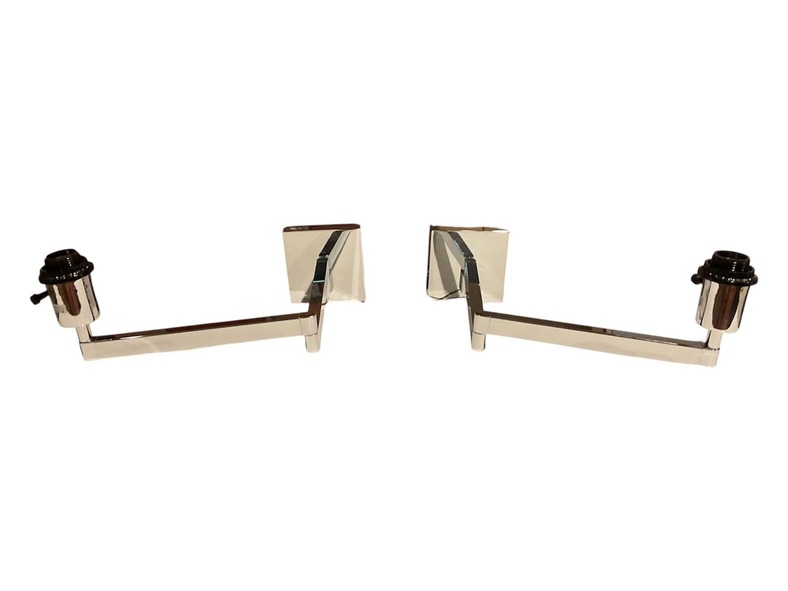 Pair of Visual Comfort Barbara Barry Sweep Medium Articulating Wall Sconces: A pair of Visual Comfort "Sweep" medium articulating wall sconces designed by Barbara Barry. Crafted with a polished chrome or nickel finish, each sconce features a square backplate and a sl