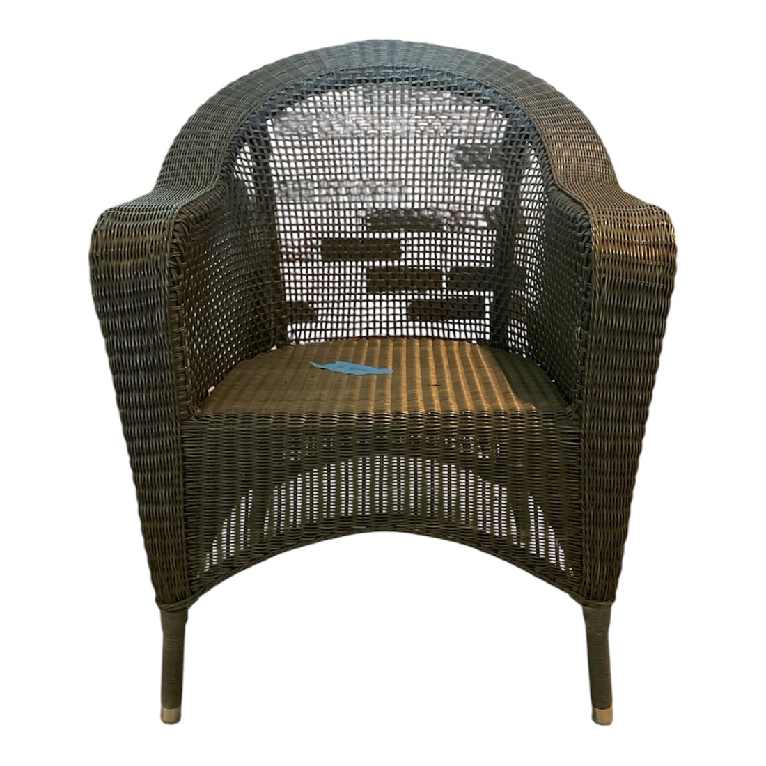 Set of Six DEDON Woven Outdoor Armchairs: Set of six DEDON outdoor armchairs featuring dark woven fiber construction with rounded wraparound backs, integrated arms, open-weave panels, and slender tapered legs with metal foot caps. The sculptu