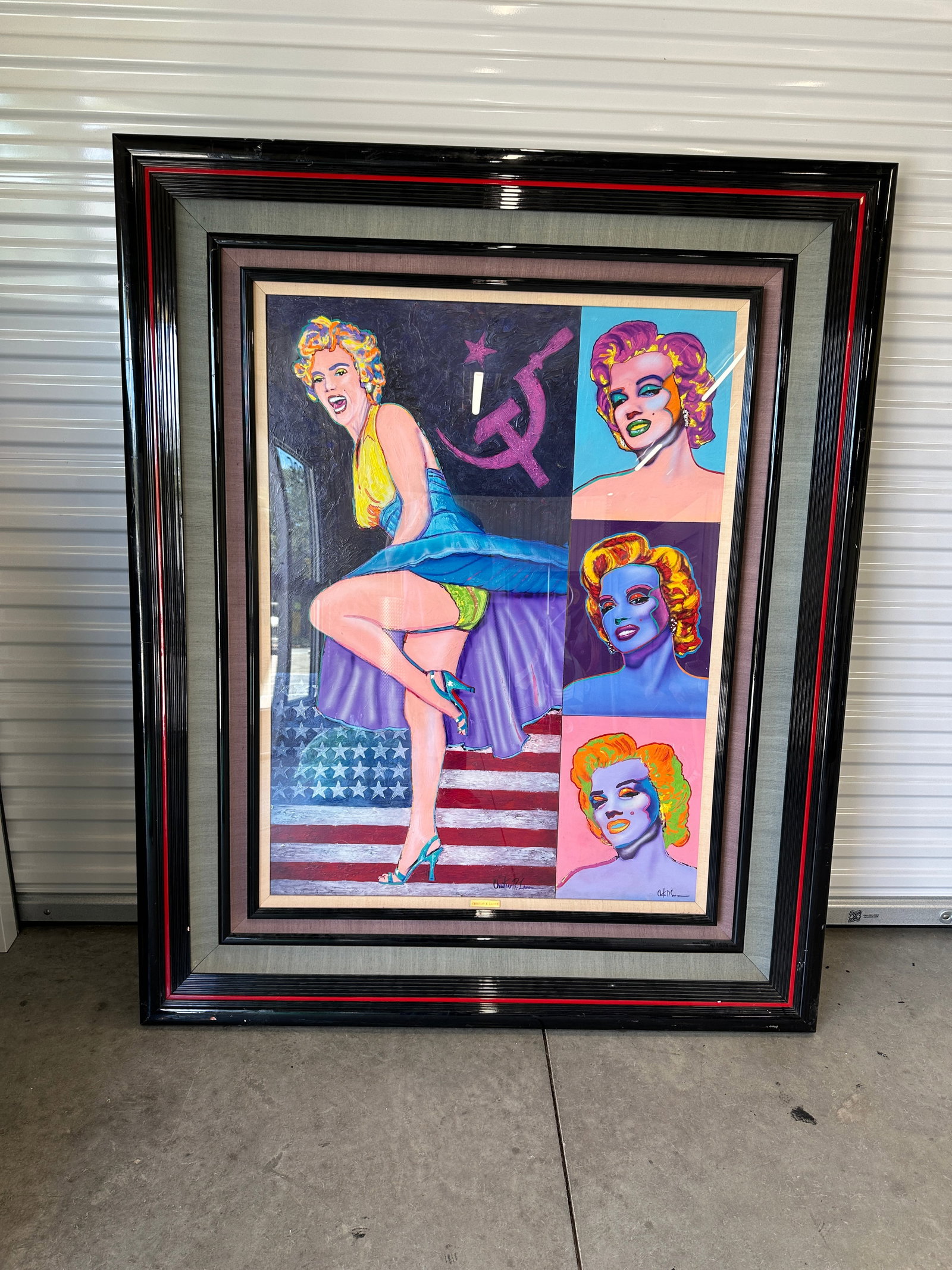 Christian Riese Lassen (American, B. 1949) Original Mixed Media on Panel: A pop art homage depicting Marilyn Monroe standing in her iconic wind-blown dress posture over an American flag motif, set against a dark textured background with a purple hammer and sickle symbol. Th