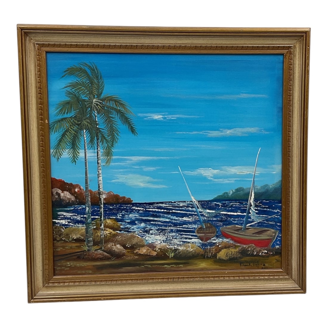 Frank Lopez Cuban Coastal Seascape Oil Painting Framed: Framed oil painting by Cuban artist Frank Lopez depicting a tropical coastal seascape with palm trees, sailboats, rocky shoreline, and vivid blue waters beneath an expansive sky. Signed lower right an
