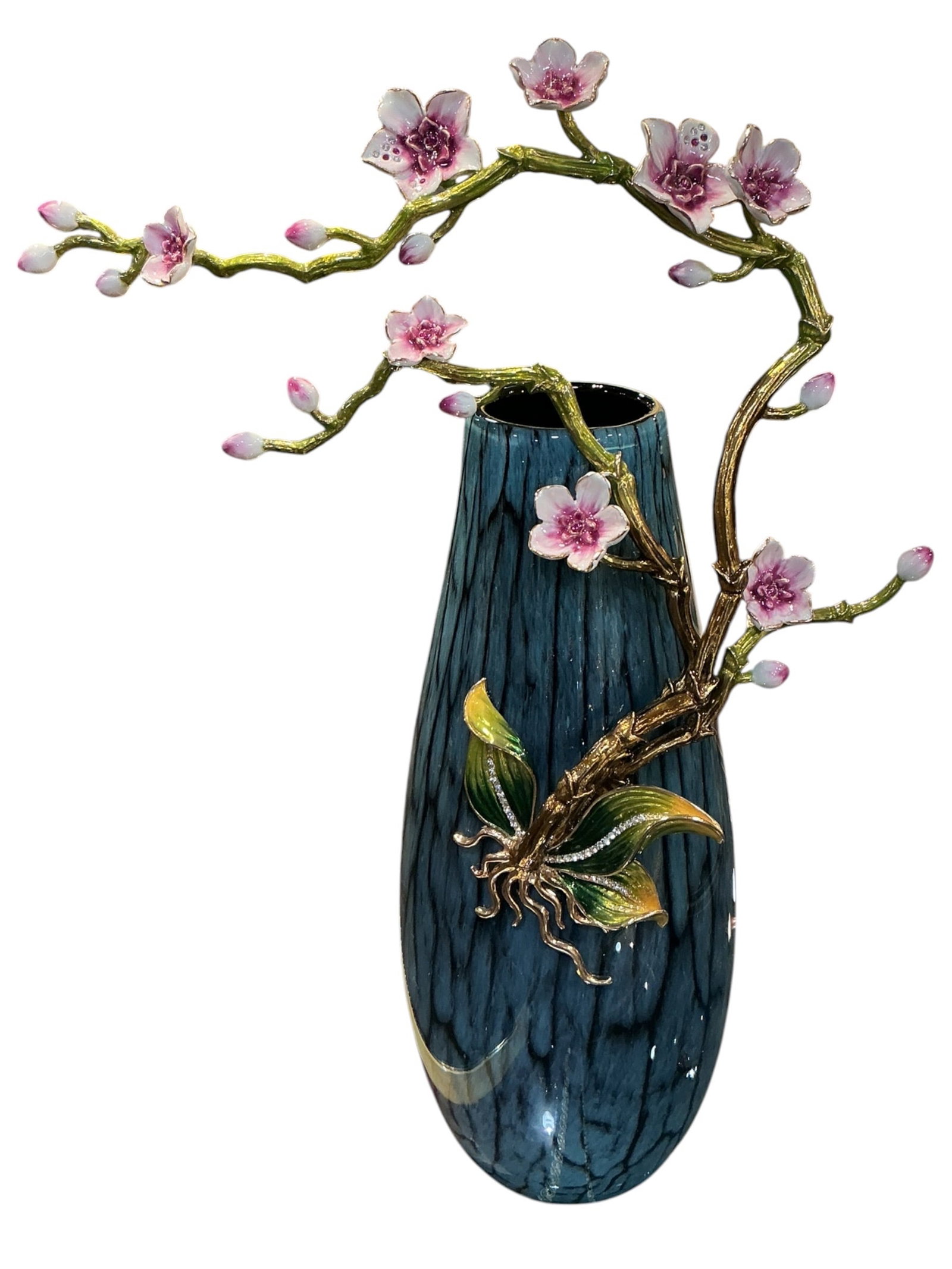 Blue Crystal and Enamel Mounted Vase with Floral Branch: A striking blue crystal vase adorned with an elaborate enamel floral branch, executed in a naturalistic European style. The vase features a tall, elongated form with vertical ribbing, crafted in trans