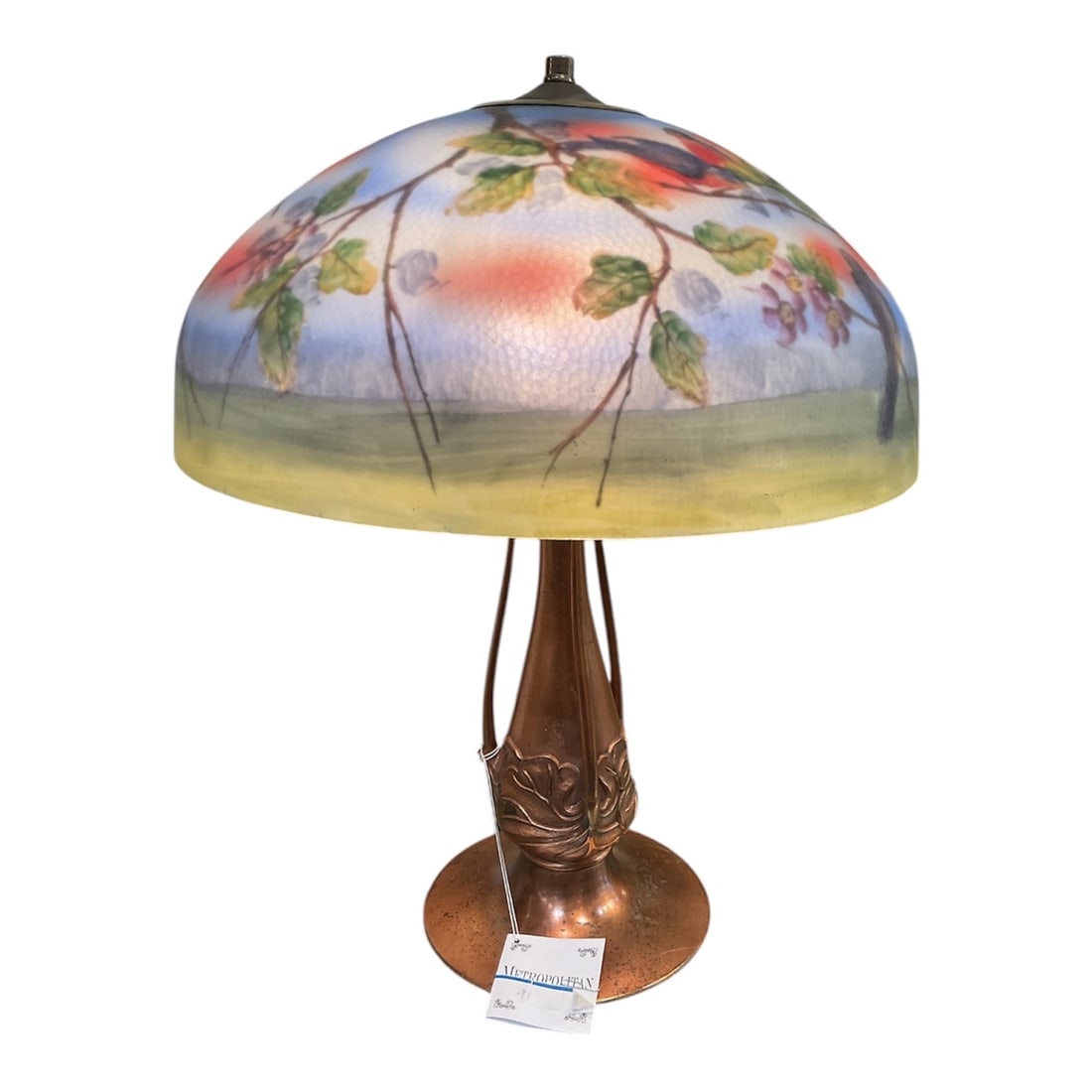 LM010 - Handel Reverse Painted Lamp with Parrot and Floral Motif, Circa 1910: A beautifully executed Handel table lamp, featuring a finely reverse-painted glass shade with a vibrant nature scene. This early 20th century example captures the artistry and craftsmanship associated