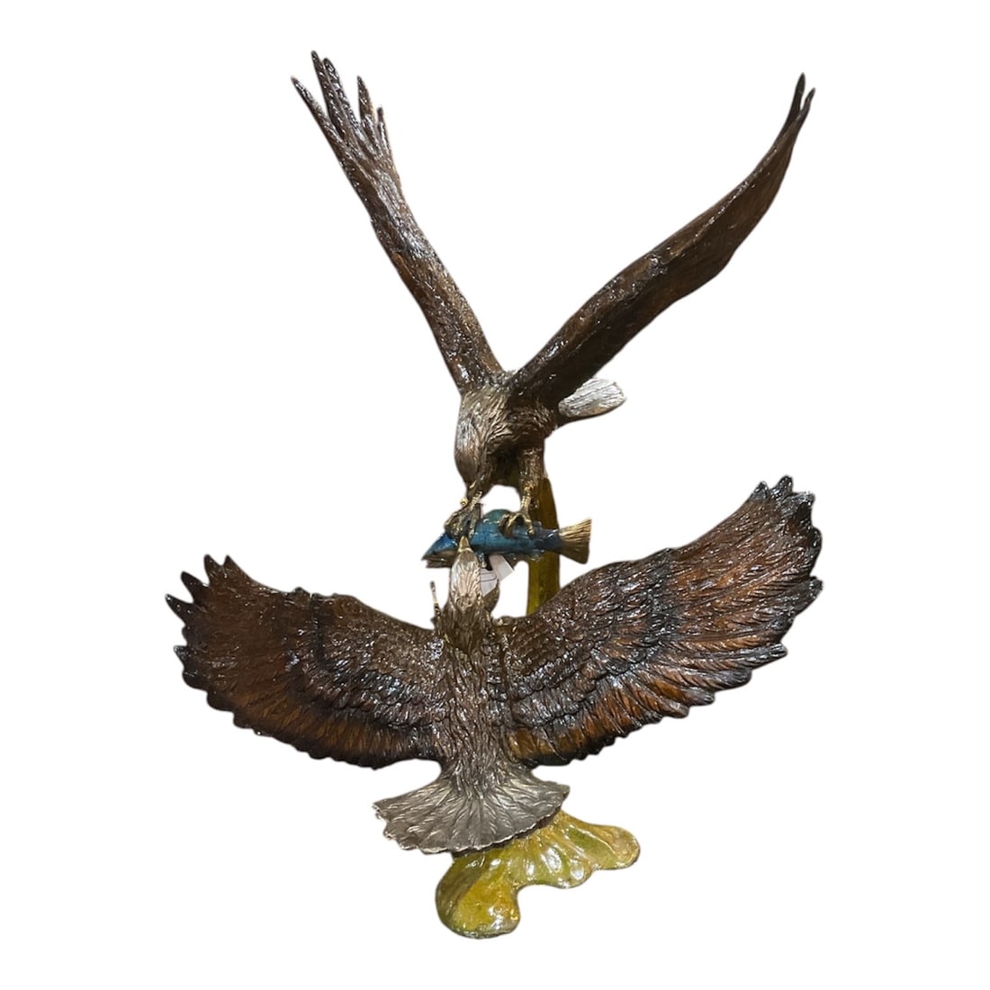 ER342 - Bronze Sculpture of Two Eagles in Flight: A powerful and dynamic bronze sculpture depicting two eagles engaged in mid-air, captured in a dramatic moment of motion and intensity. This striking composition highlights the strength, grace, and sy