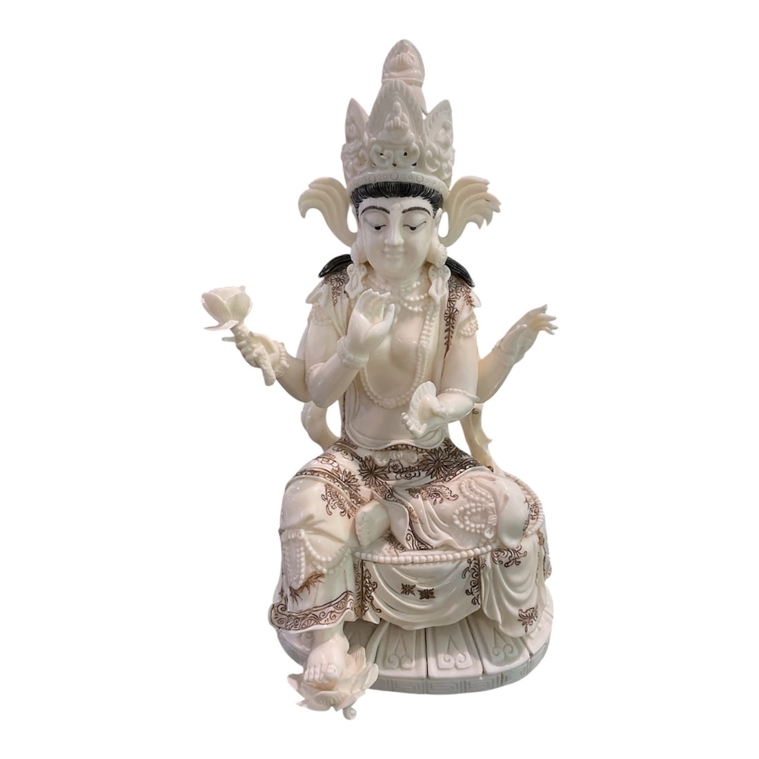 IC1298 - Carved Asian Multi-Armed Goddess Figure: A finely detailed carved figure depicting a multi-armed goddess, likely inspired by traditional Asian religious iconography, representing compassion, grace, and spiritual power. The sculpture is execu
