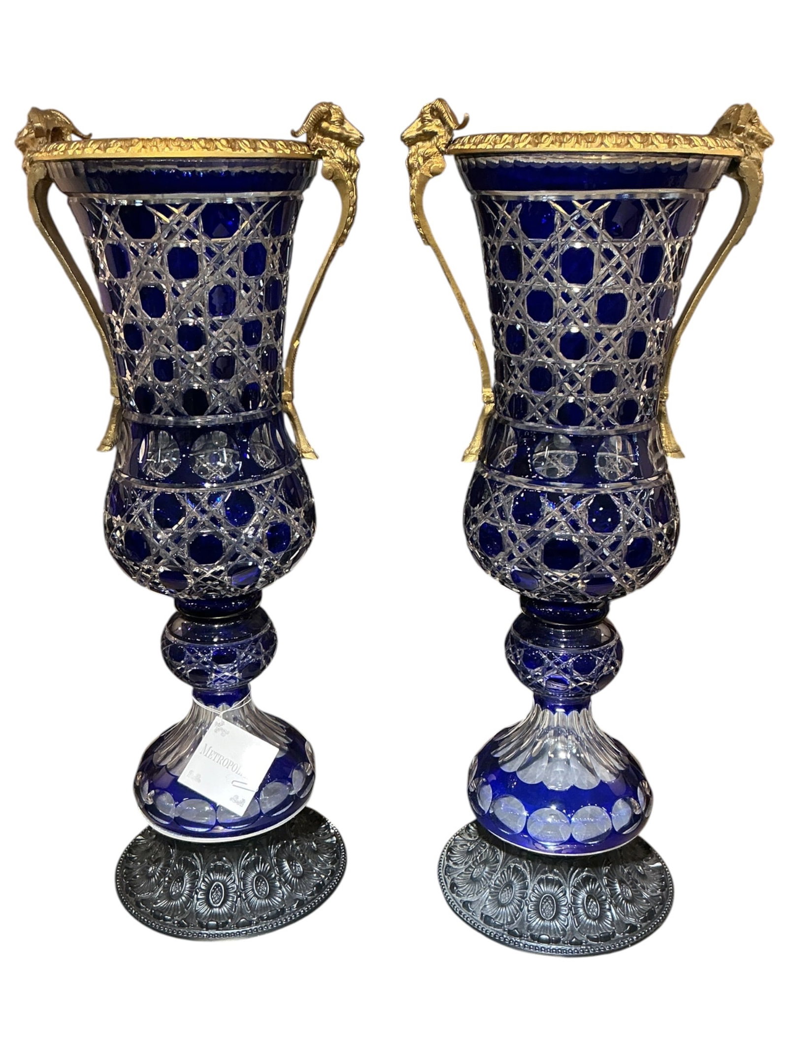 CS929 - Pair of Blue Cut Crystal and Dore Bronze Vases with Ram Head Handles: An impressive pair of vases crafted in deep