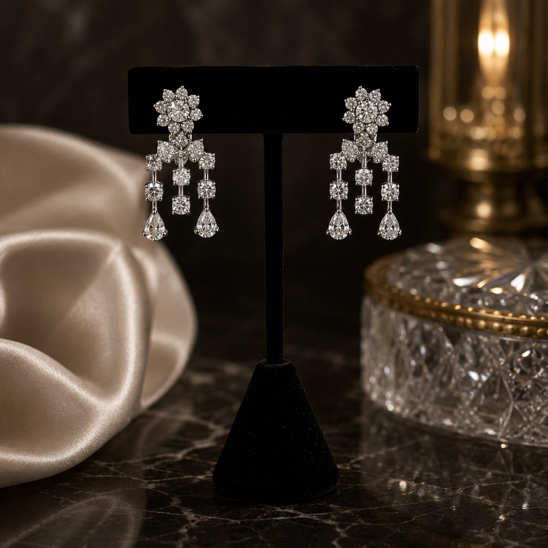 Pair of 18K White Gold Natural Diamond Earrings with Gemological Report: Elegant pair of 18K white gold earrings set with natural white diamonds. According to the accompanying