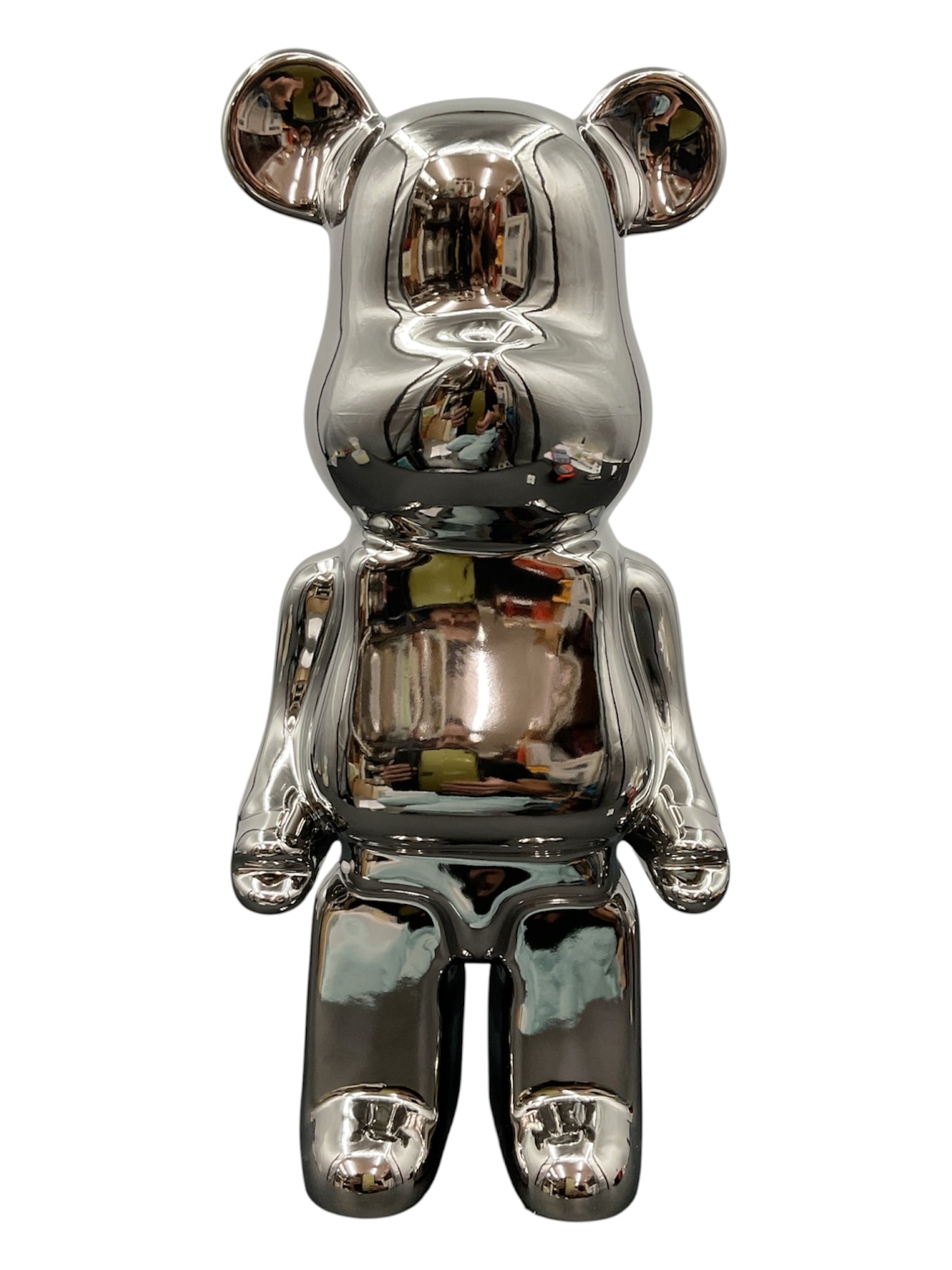 Contemporary Chrome Bearbrick Style Coin Bank Sculpture: Contemporary decorative sculpture in the form of a stylized bear figure with a reflective chrome-tone metallic finish. Designed in the manner of Bearbrick and modern pop art collectibles, the piece fe