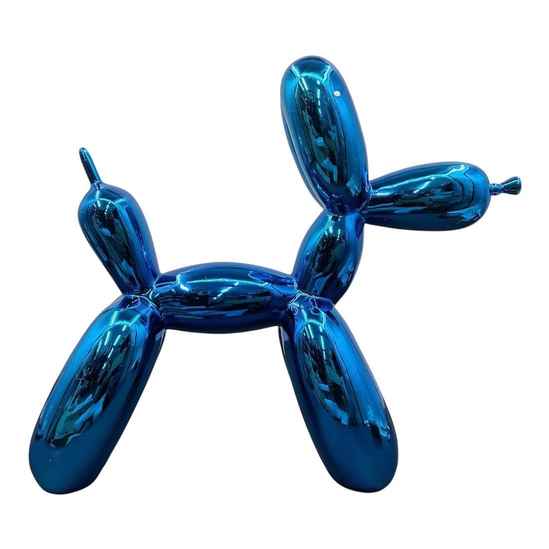 Contemporary Metallic Blue Balloon Dog Sculpture: Contemporary balloon dog sculpture executed in a reflective metallic blue finish. The sculpture emulates the appearance of a twisted balloon animal in the manner of modern pop art design, featuring sm