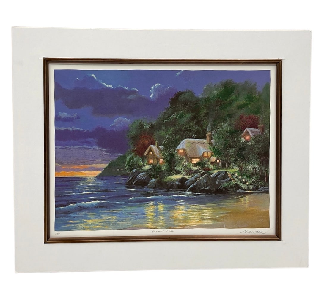 Andrew Warden Oceans Edge Limited Edition Serigraph AP w/ COA: A framed limited edition serigraph on heavyweight paper titled Oceans Edge by Andrew Warden, dated 2000. The composition depicts a tranquil coastal scene at dusk, with waves gently meeting the shoreli