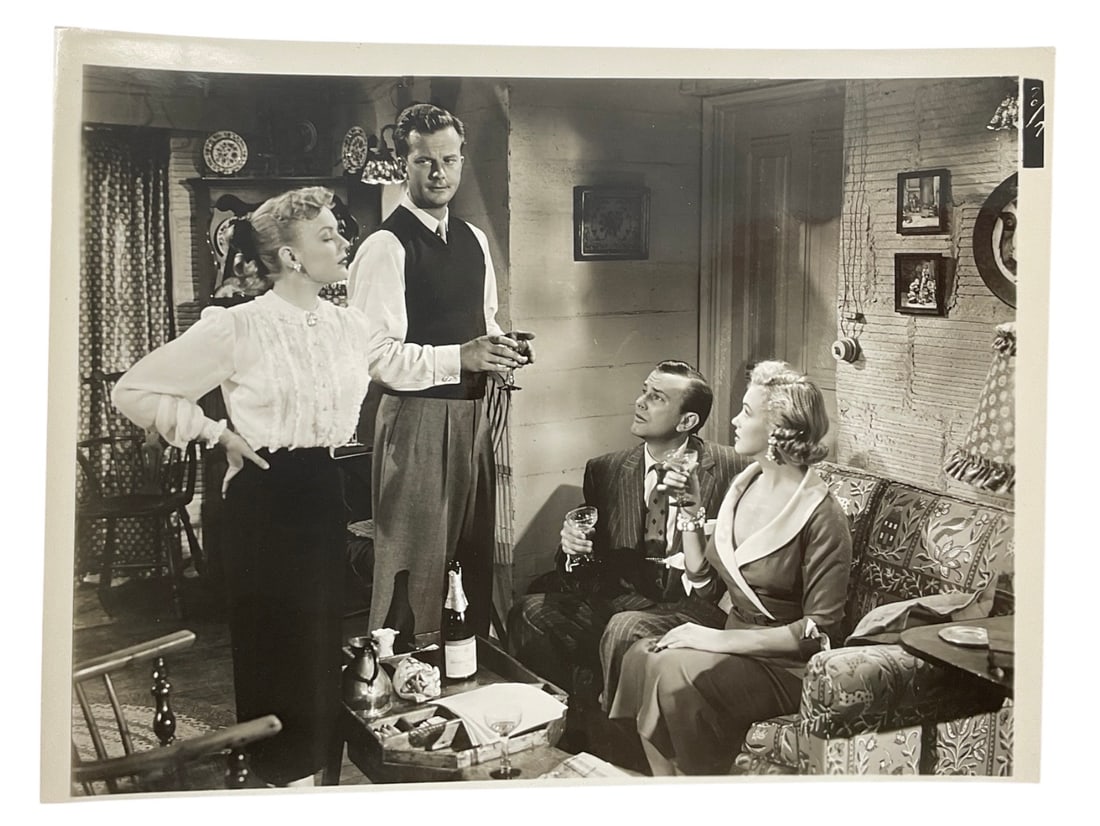 Marilyn Monroe in Love Nest Silver Gelatin Print Type 1 Photograph: A vintage silver gelatin production still photograph from the 1951 Twentieth Century-Fox comedy film "Love Nest." The promotional image features a group portrait of the primary cast members,
