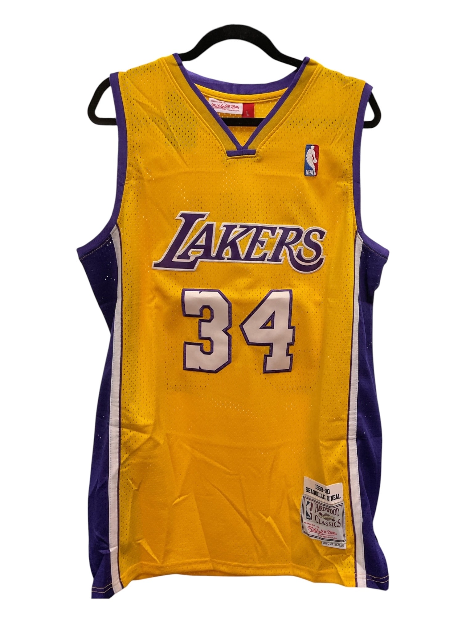 Shaquille O'Neal Signed Los Angeles Lakers Jersey: Gold Los Angeles Lakers Mitchell & Ness hardwood classics jersey featuring the name "O'Neal" and number "34" on the reverse, boldly signed by Shaquille O'Neal in black 