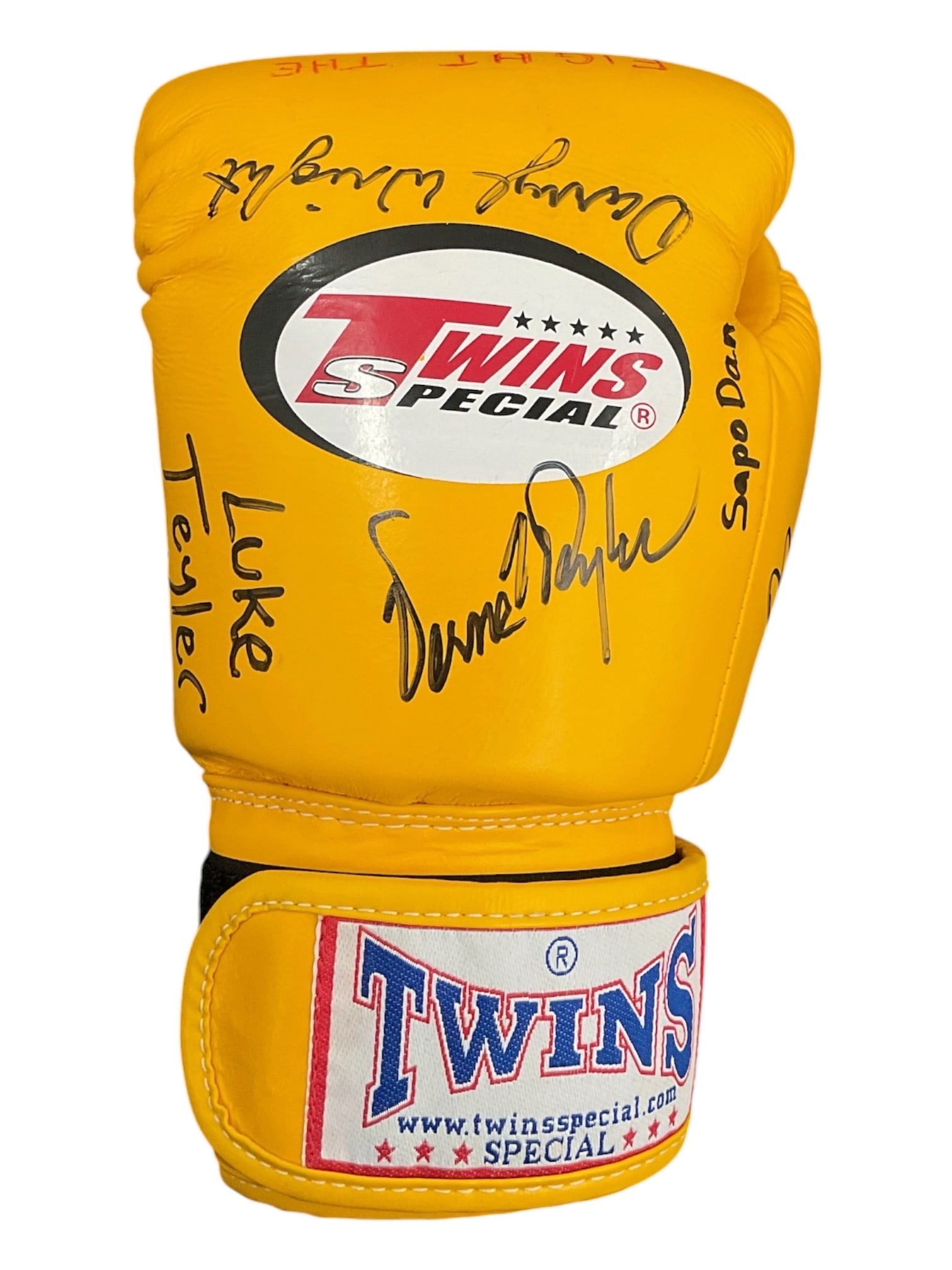Signed Twins Special "Thailand-Cambodia 2010" Yellow Boxing/Muay Thai Glove: DescriptionA yellow leather Twins Special brand boxing/Muay Thai glove featuring multiple signatures and handwritten inscriptions. The top striking surface displays a hand-lettered inscription i