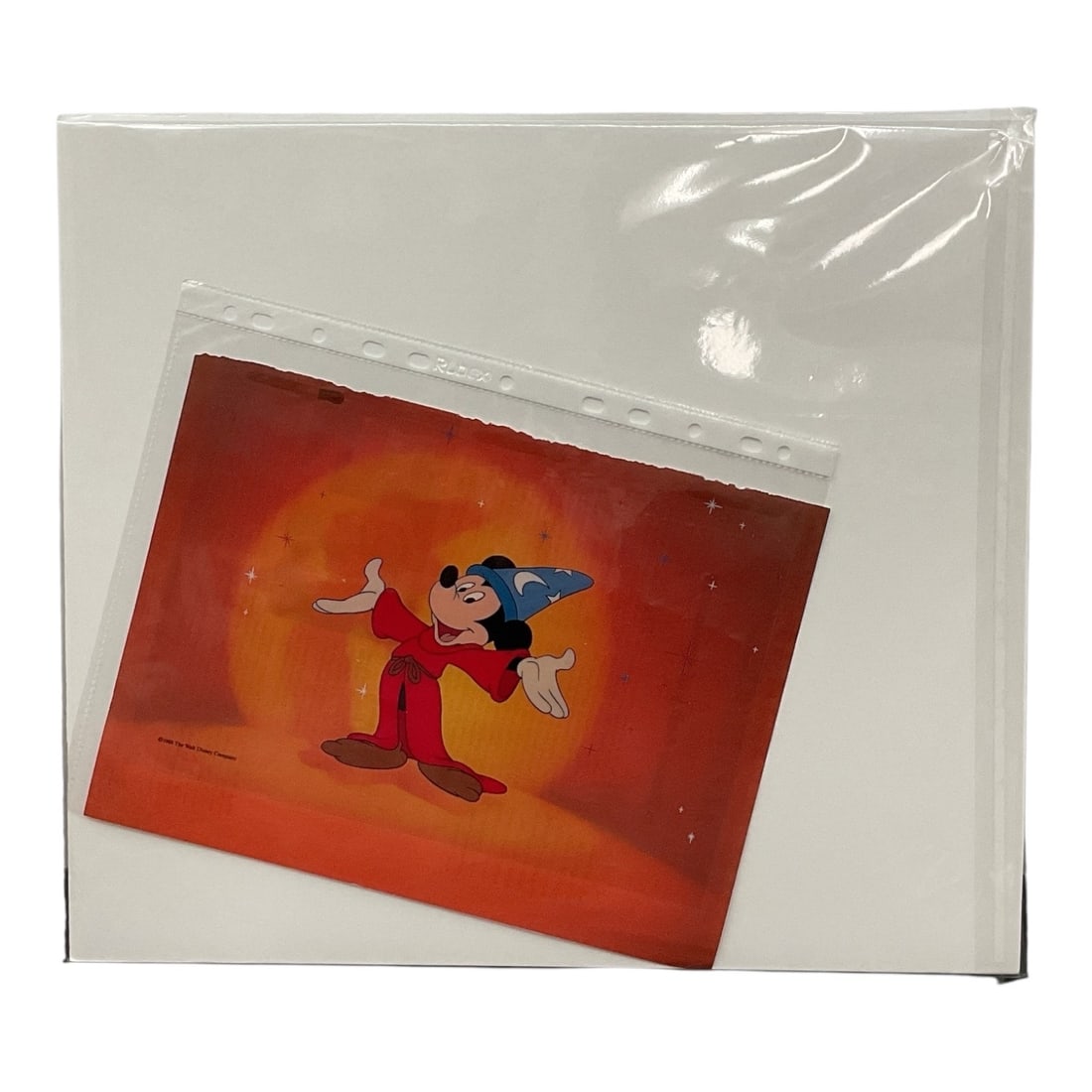 Disney "Fantasia" Limited Edition Sericel: Limited edition Disney sericel featuring Sorcerer Mickey from the classic animated film Fantasia. The image depicts Mickey in his iconic red robe and blue wizard's hat aga