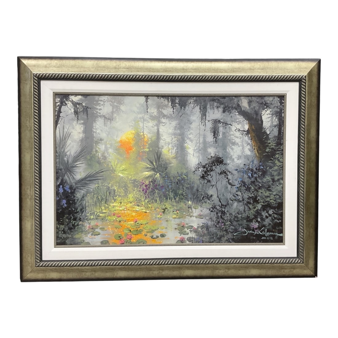 "Golden Light" by James Coleman (United States, B.1949) Embellished Giclée on Canvas: This framed, hand-embellished limited edition giclée on canvas depicts a vibrant, atmospheric wetland landscape illuminated by a glowing sunset. A warm, brilliant light bursts through a misty, 
