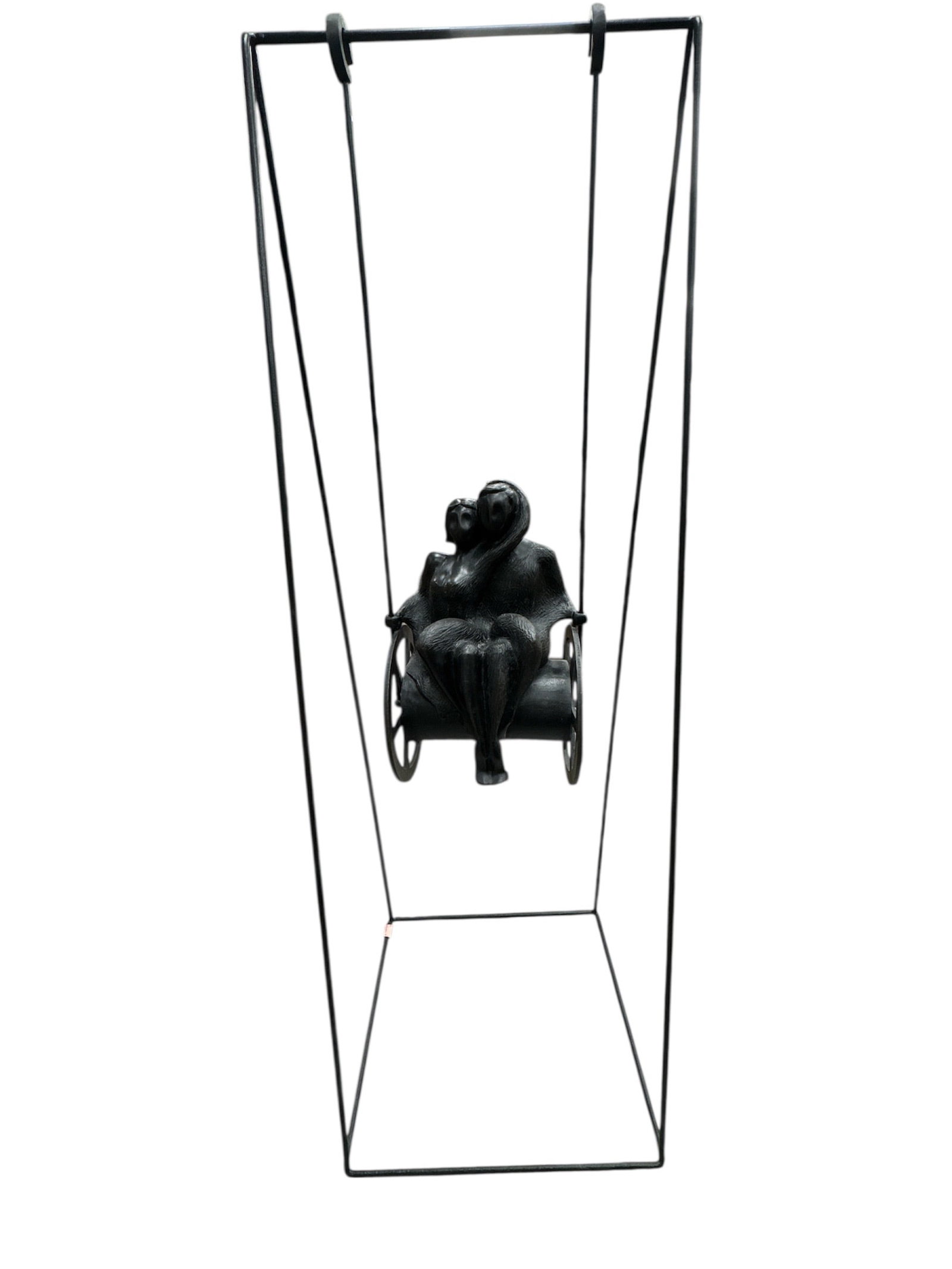 Julio Cesar Briceno (Venezuela, b.1950) Bronze Swing: This monumental bronze sculpture by Julio Cesar depicts an intimate seated couple embraced together on a suspended swing-like structure. The figures are rendered in a stylized, rounded form with textu