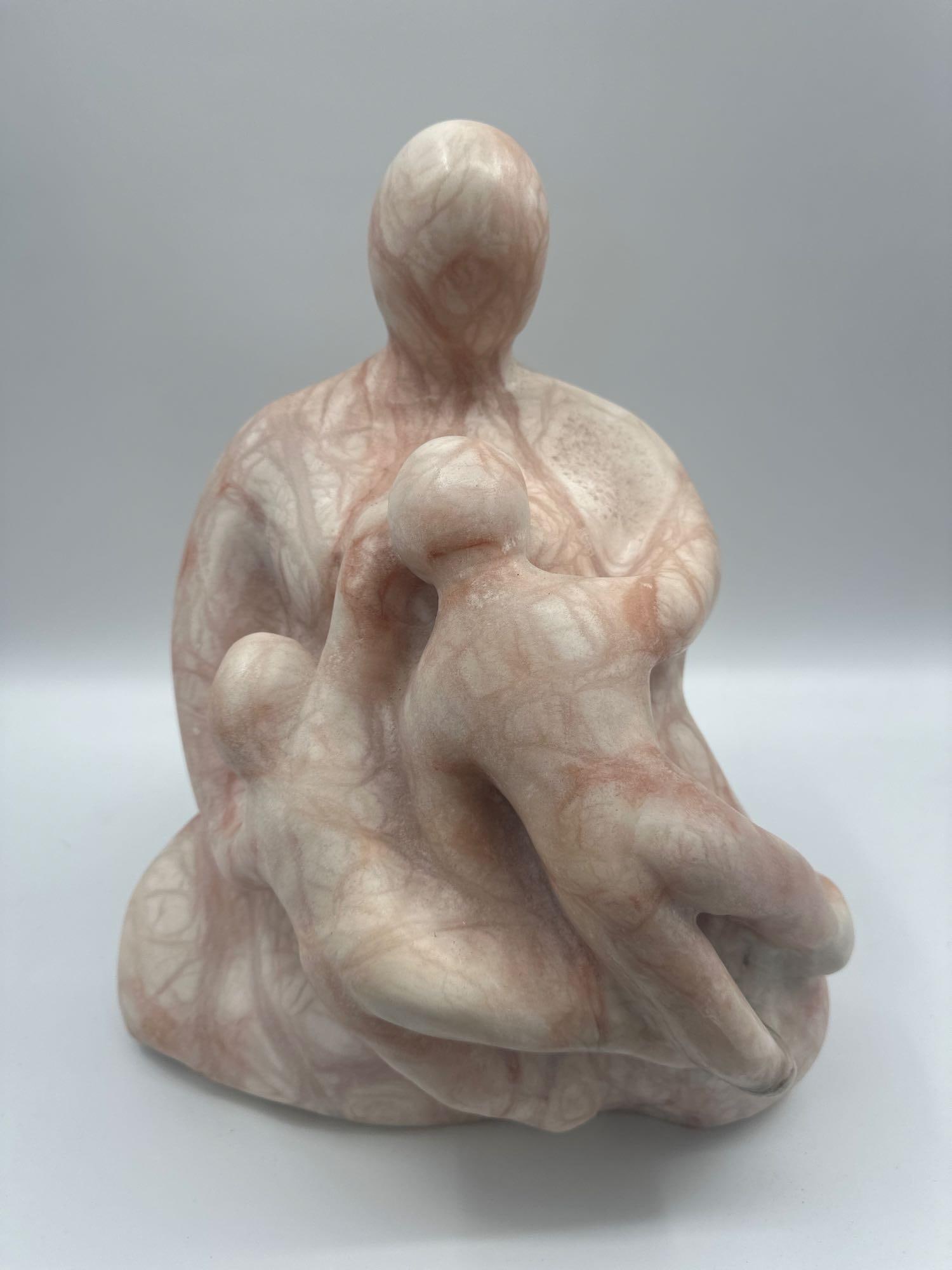 Modern Abstract Stone Sculpture of Parent and 2 Children (1 of 6)