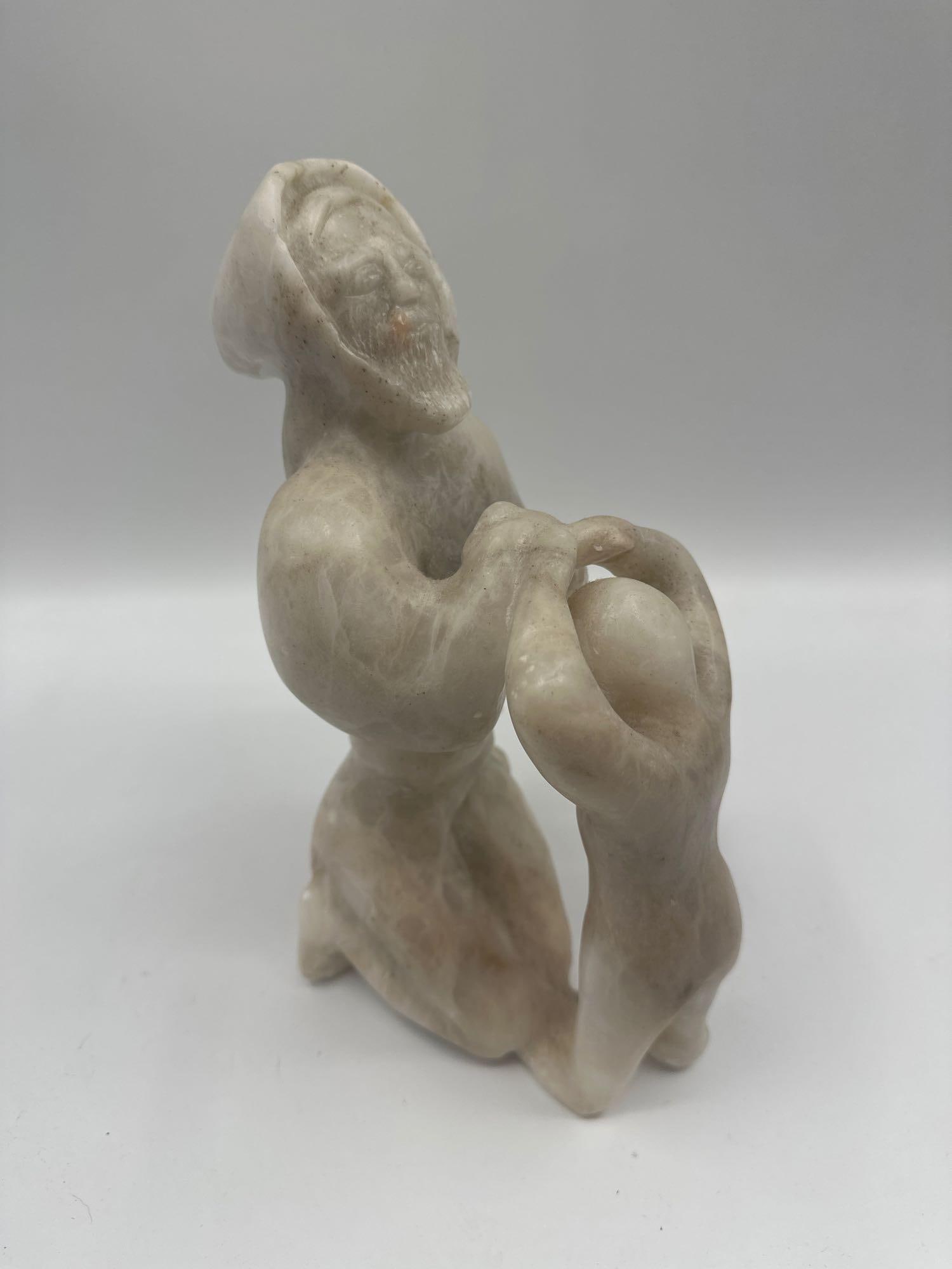 Hand-Carved Stone Sculpture of a Bearded Man with Child (1 of 5)
