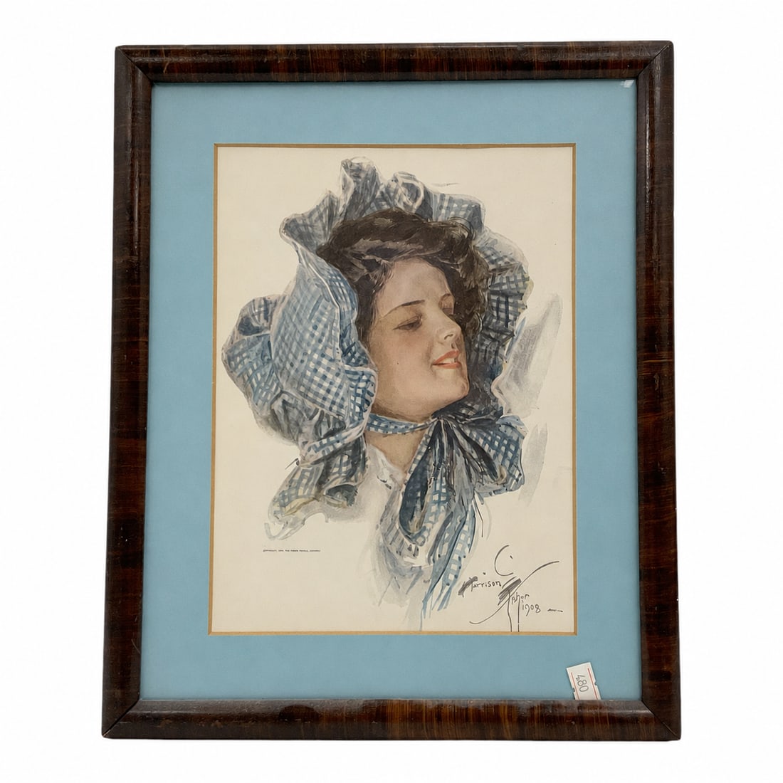 Harrison Fisher (American, 1875-1934)Framed Penelope Portrait Print: An illustration depicting a young woman adorned in a voluminous blue and white checkered bonnet tied neatly beneath her chin. She is rendered in profile with dark styled hair, soft facial features, an