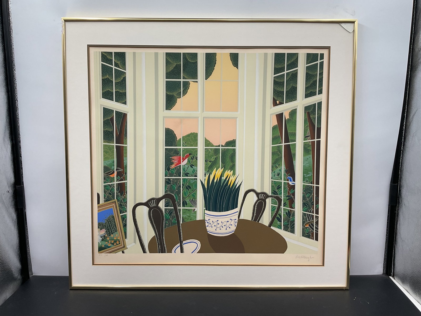 Thomas McKnight (American, b. 1941) “Bennington Room?? Limited Edition Serigraph, H.C. 1/30: Limited edition serigraph titled “Bennington Room” by renowned American artist Thomas McKnight. This colorful interior scene depicts a sunlit dining room with an open bay window overlookin