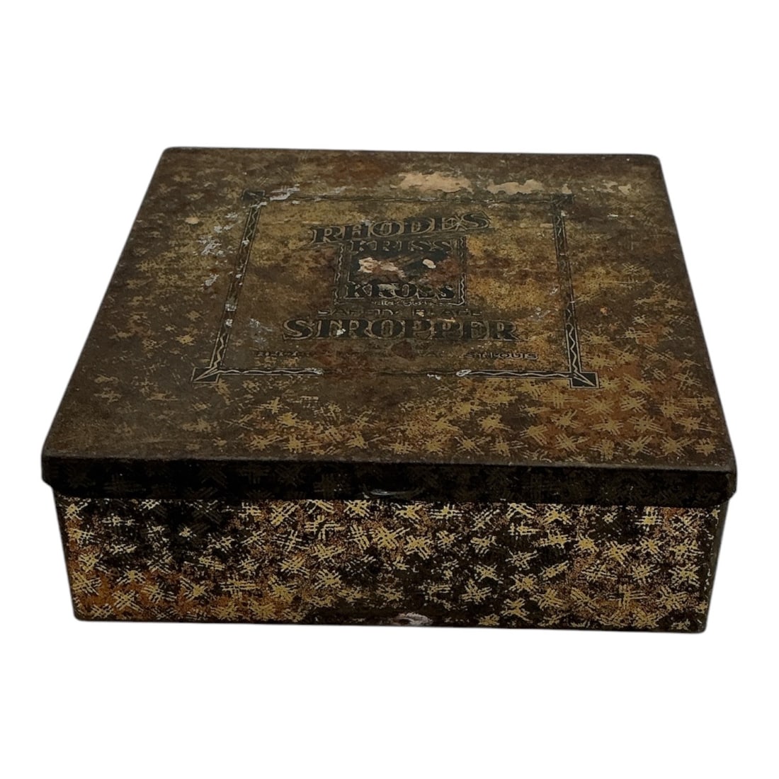 Vintage Rhodes Kriss Kross Safety Razor Blade Stropper Tin and Mechanical Sharpener: An early 20th-century mechanical razor blade sharpener manufactured by the Rhodes Kriss Kross Corporation of St. Louis, Missouri. The set features a hand-cranked metal stropping mechanism with a rotar