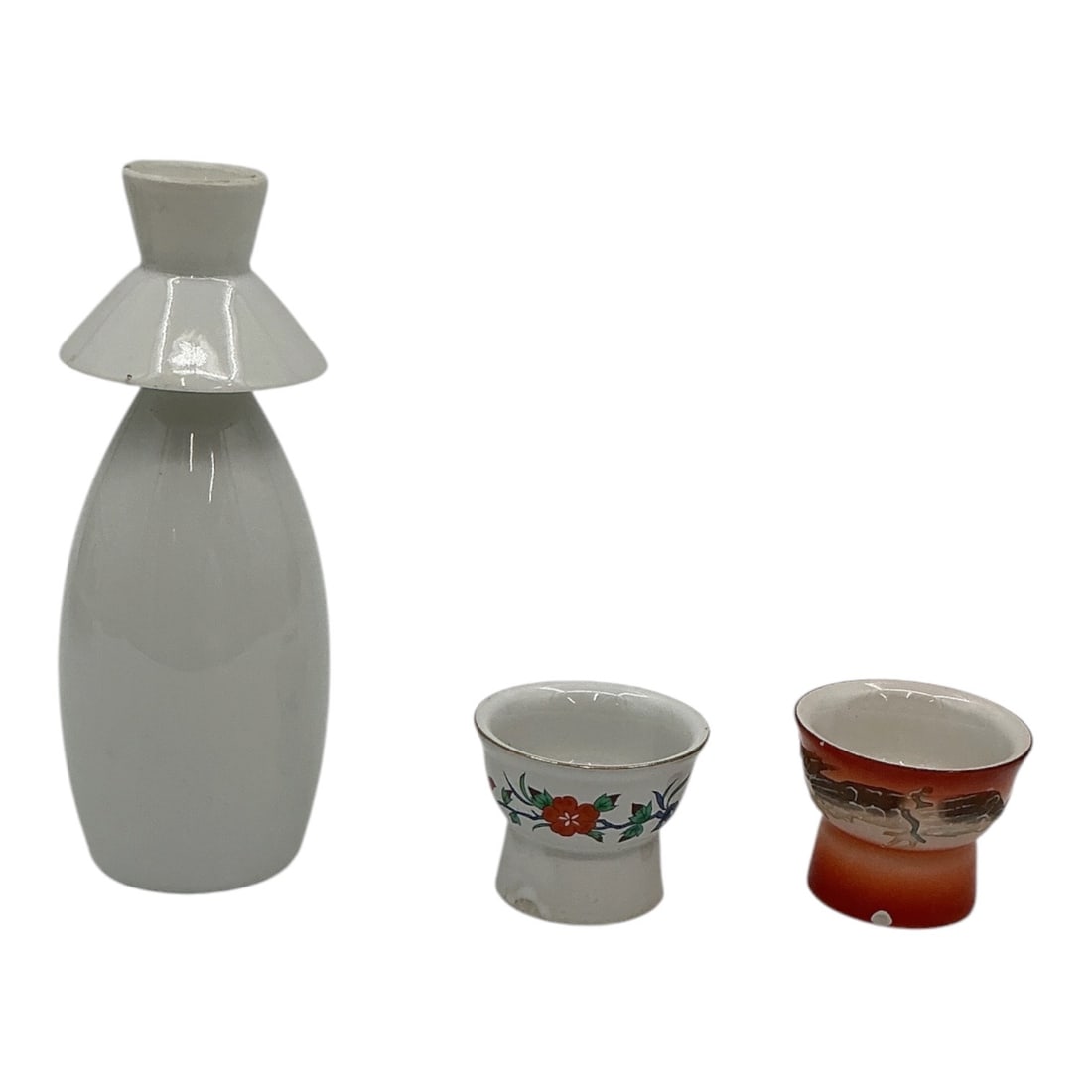 Japanese Porcelain Sake Bottle and Two Cups Set by MCK (Japanese, 20th Century): Specifications Title: "Japanese Porcelain Sake Bottle and Two Cups Set"