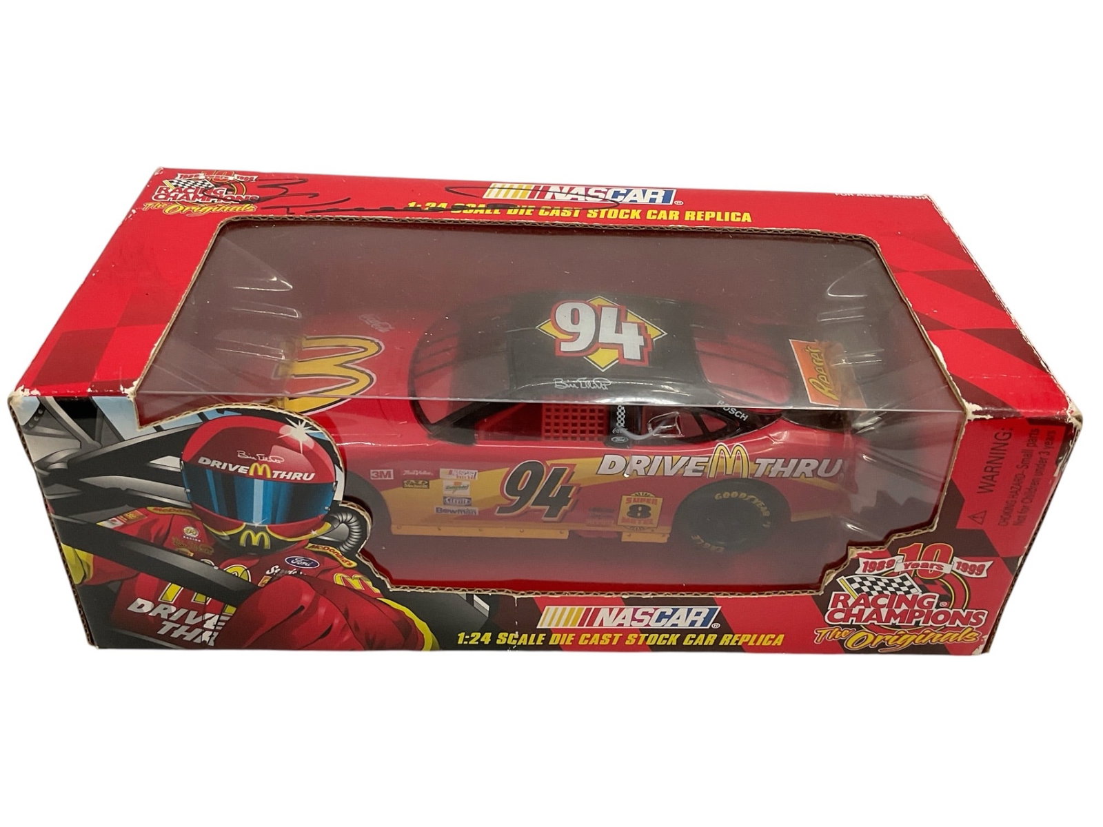 Signed NASCAR Bill Elliott No. 94 McDonald's 1:24 Scale Die-Cast Race Car: Vintage NASCAR collectible die-cast race car featuring Bill Elliott's No. 94 McDonald's Ford Thunderbird racing livery. Presented in its original illustrated retail box with McDonald's