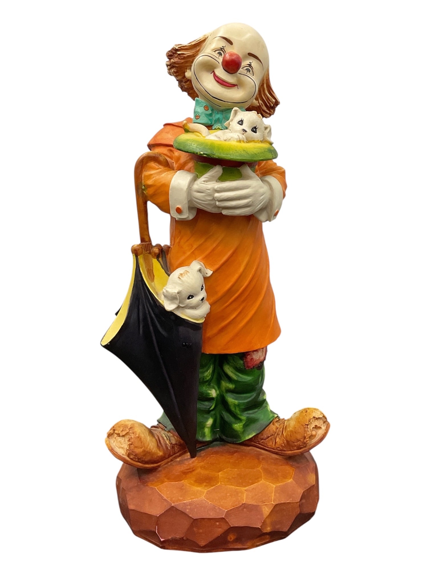 G.L. Rossi Figural Clown with Umbrella Sculpture: Large G.L. Rossi decorative clown figurine depicting a smiling circus performer dressed in a bright orange coat, green trousers, oversized shoes, and ruffled collar. The clown holds a closed black umb