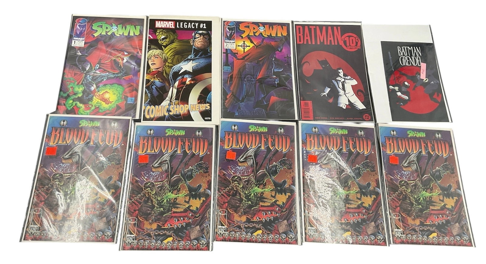 Lot of 10 Spawn, Batman & Independent Comic Books: Collection of 10 assorted comic books featuring Spawn, Batman, and independent superhero titles. The grouping includes multiple Spawn-related issues, a Batman comic with distinctive specialty cover