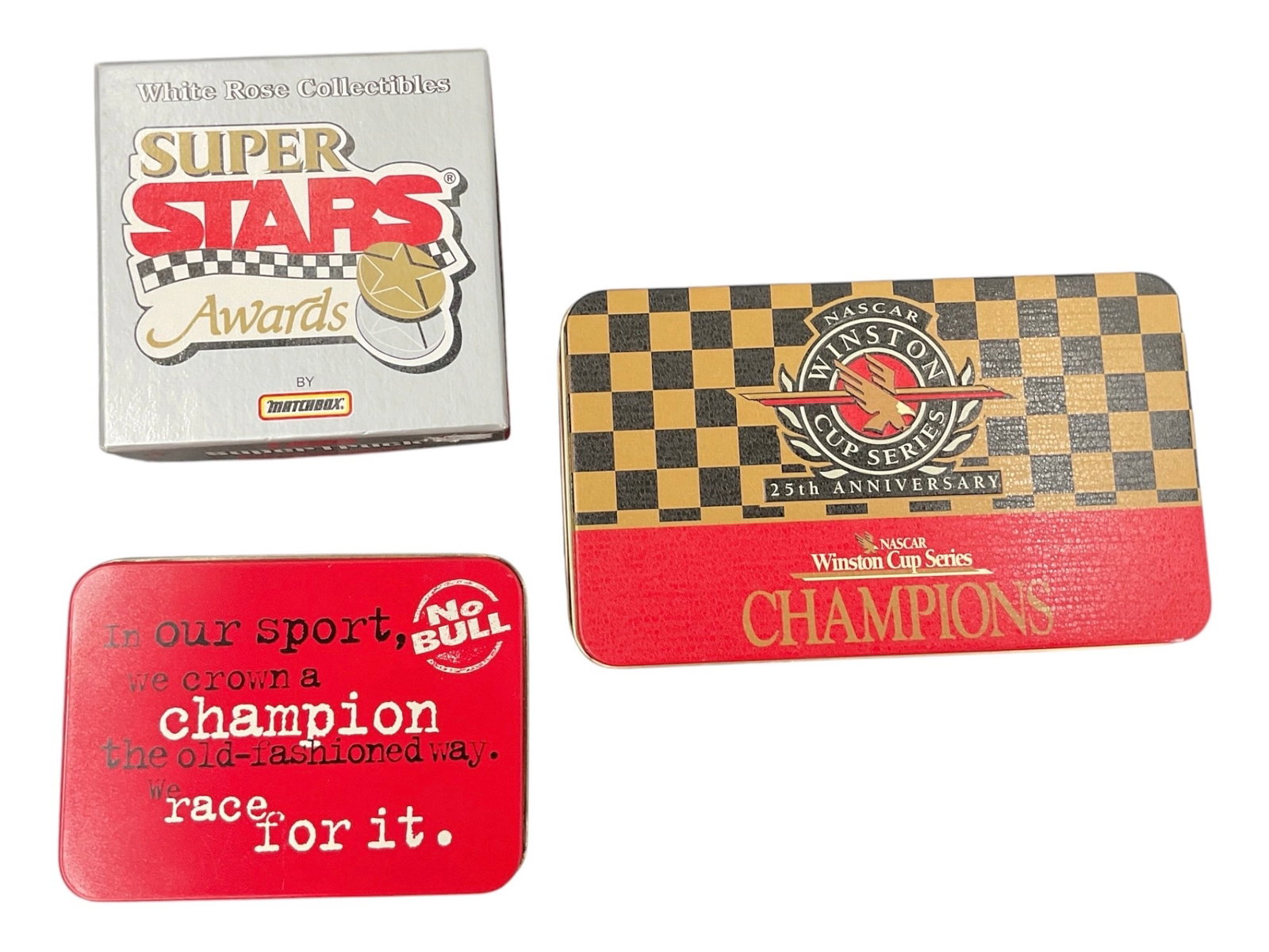 Assorted NASCAR & Winston Cup Collector Card Sets in Tins: Collection of NASCAR and Winston Cup racing trading cards presented in three collectible tins/boxes. The grouping includes a Winston Cup Champions 25th Anniversary collector tin, a Winner’s