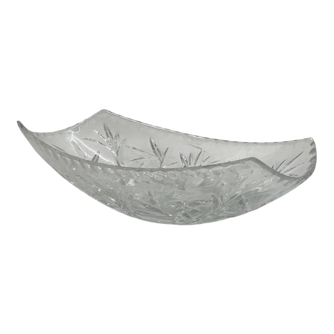 Cut Crystal Centerpiece Bowl: Clear 24% lead crystal boat-shaped centerpiece bowl featuring traditional starburst and fan cut patterns with an upward-sweeping scalloped rim.