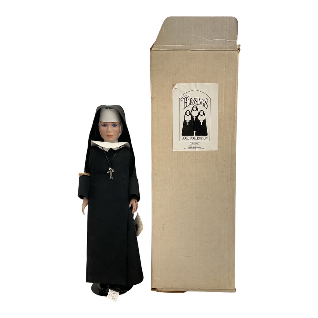 Blessings “Expressions of Faith?? Catholic Nun Doll in Original Box: Vintage collectible nun doll from the Blessings “Expressions of Faith” Doll Collection. The figure is dressed in a traditional black religious habit with white wimple and veil and wears a 