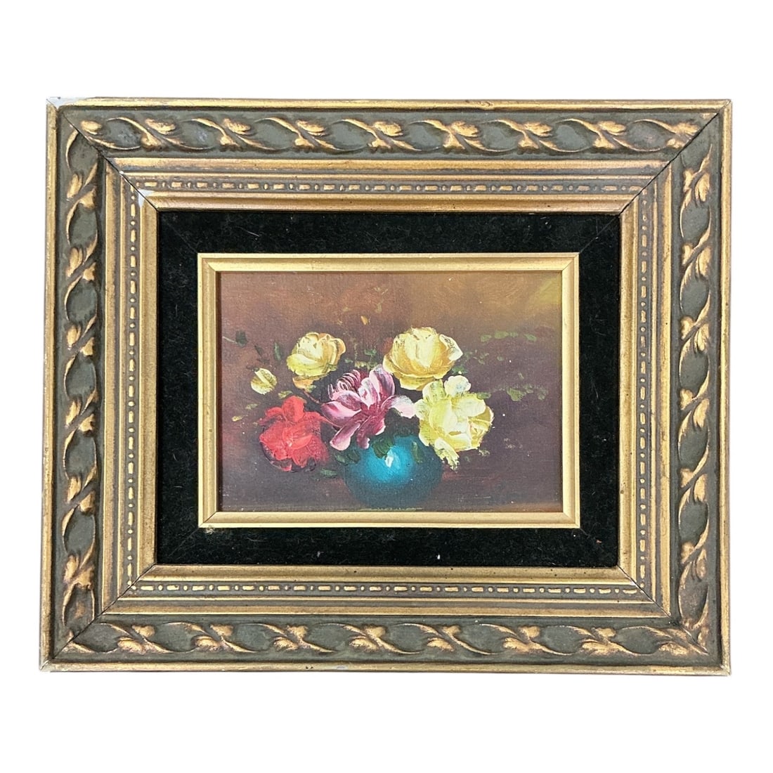 Floral Still Life with Roses in Blue Vase Oil on Canvas Board: Specifications Title: Floral Still Life with Roses in Blue Vase Medium: Oil on Canvas Board Signature: Indistinctly Signed Lower Right Framing: Carved Gilt Wood Frame with Black Velvet Mat Liner