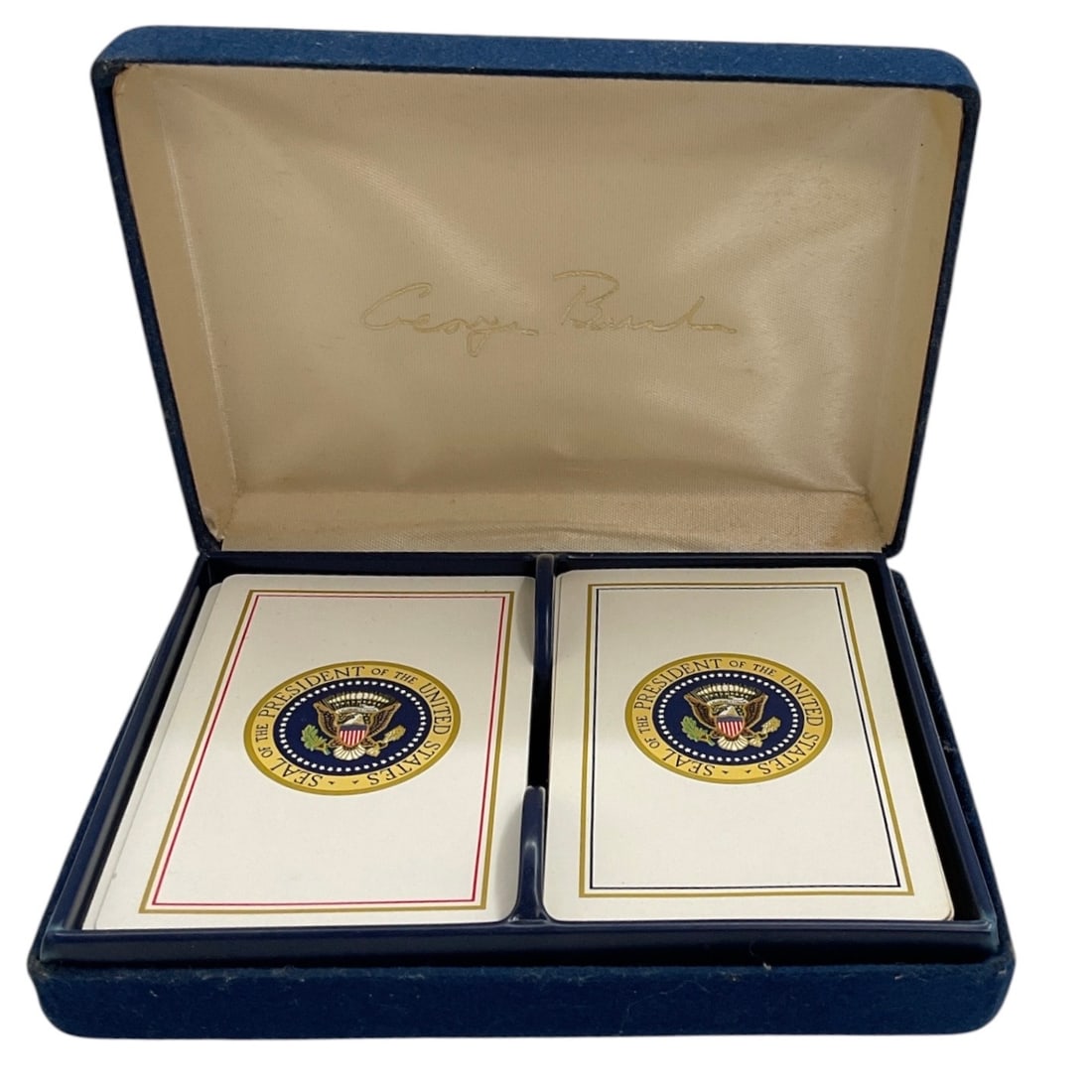 Ronald Reagan Presidential Seal Playing Card Set in Presentation Case: Collectible double-deck playing card set presented in a fitted blue presentation case associated with President Ronald Reagan. Each deck features the Seal of the President of the United States on the