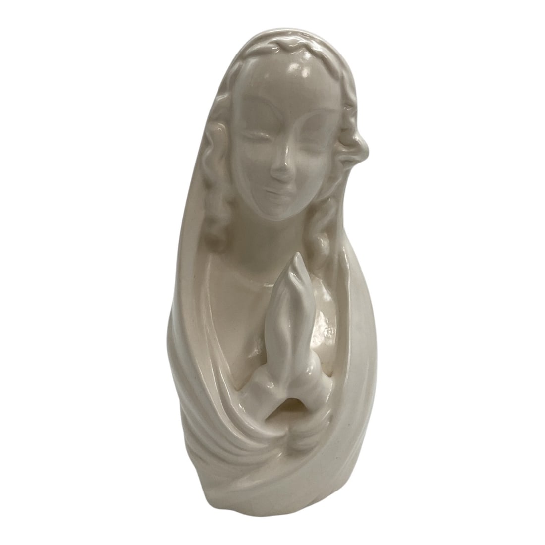Vintage Porcelain Blessed Virgin Mary Praying Bust Figurine: Vintage white porcelain figurine depicting the Blessed Virgin Mary with her hands clasped in prayer. The sculptural bust features a serene facial expression, flowing veil, and softly modeled details t