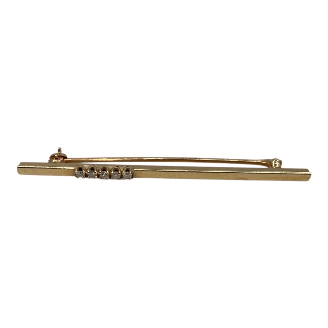 Antique Yellow Gold and stones Bar Brooch: Antique yellow gold bar brooch featuring a sleek elongated linear design accented at the center with a row of stones. The understated geometric form and delicate diamond detailing create an elegant, t