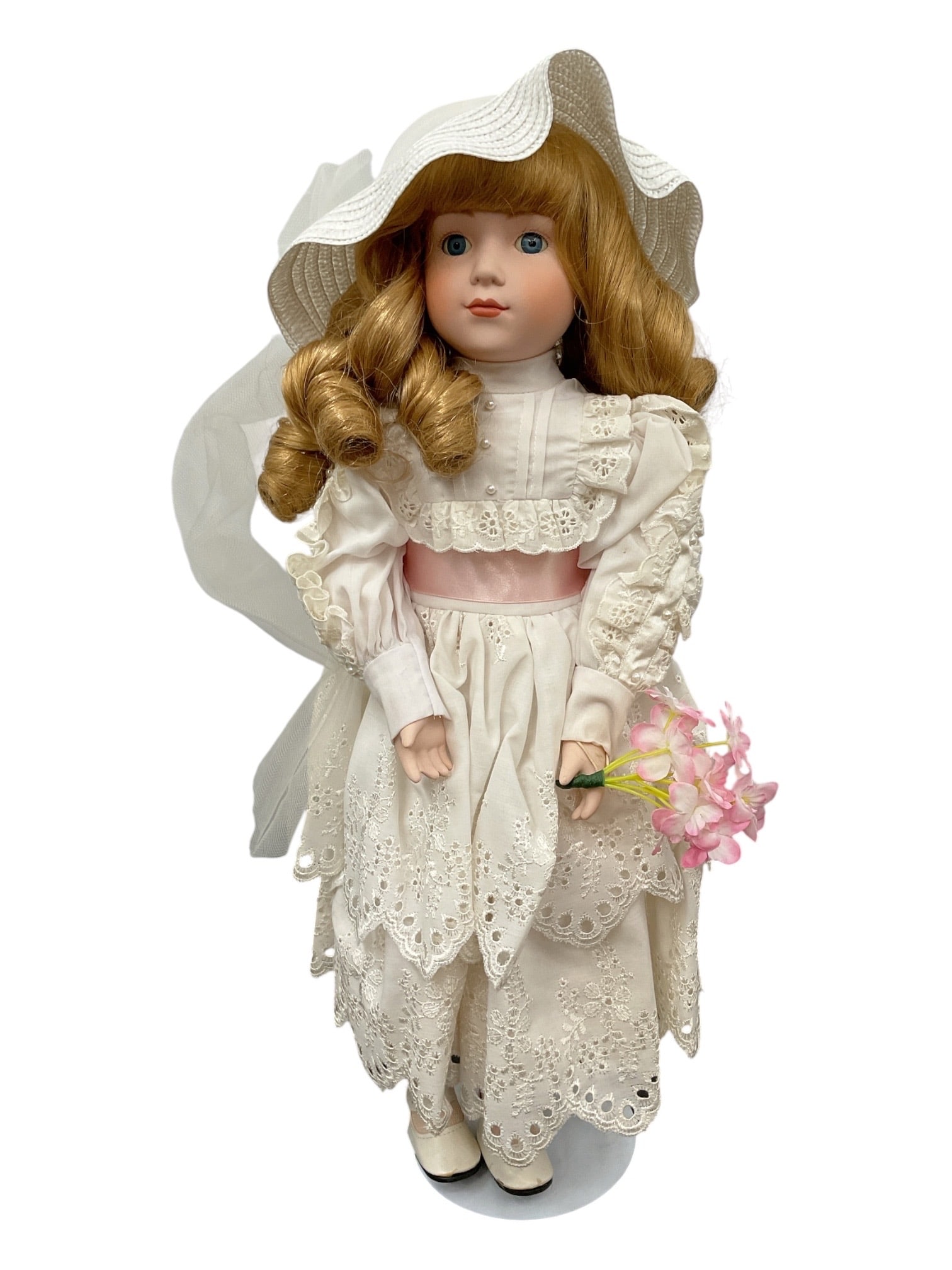 Vintage Victorian-Style Porcelain Bride Doll with Lace Dress & Bonnet: Decorative vintage-style porcelain doll dressed in an elaborate Victorian-inspired bridal ensemble. The doll features a porcelain-style face with painted features, blue eyes, and long blonde hair arra