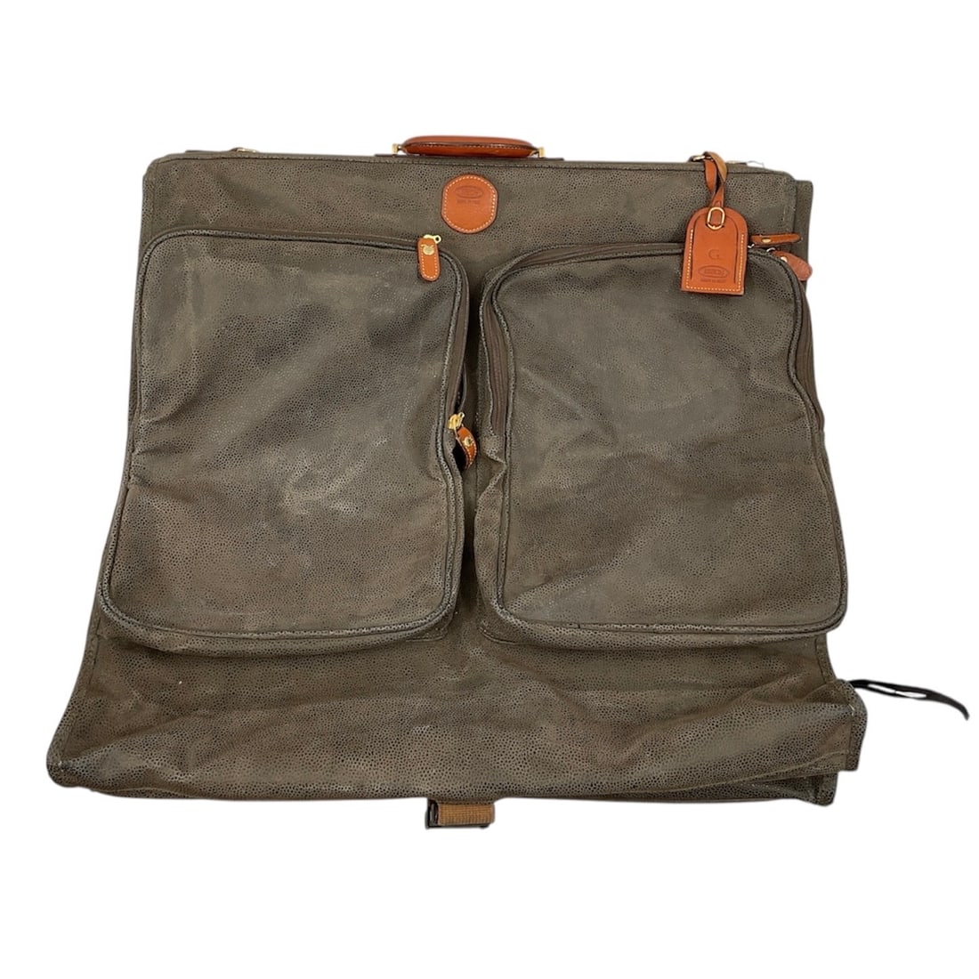 Vintage Bric's Milano Garment Bag: Vintage Bric's Milano Garment Bag. This high-quality Italian travel accessory is designed for the sophisticated traveler who valu