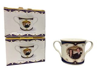 Royal Crest Prince William & Catherine Middleton 2011 Wedding Loving Cups (Pair): A pair of commemorative fine bone china loving cups issued for the Royal Wedding of H.R.H. Prince William and Catherine Middleton, dated 29th April 2011. Each cup features a central portrait medallion