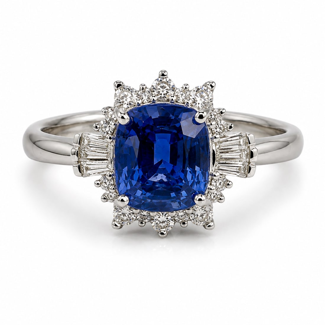 14K White Gold Natural Sapphire & Diamond Ring with AIGL Appraisal: Elegant 14K white gold ring featuring a vivid cushion-cut natural blue sapphire as the centerpiece. The sapphire is framed by round brilliant-cut diamonds arranged around the perimeter, with baguette-