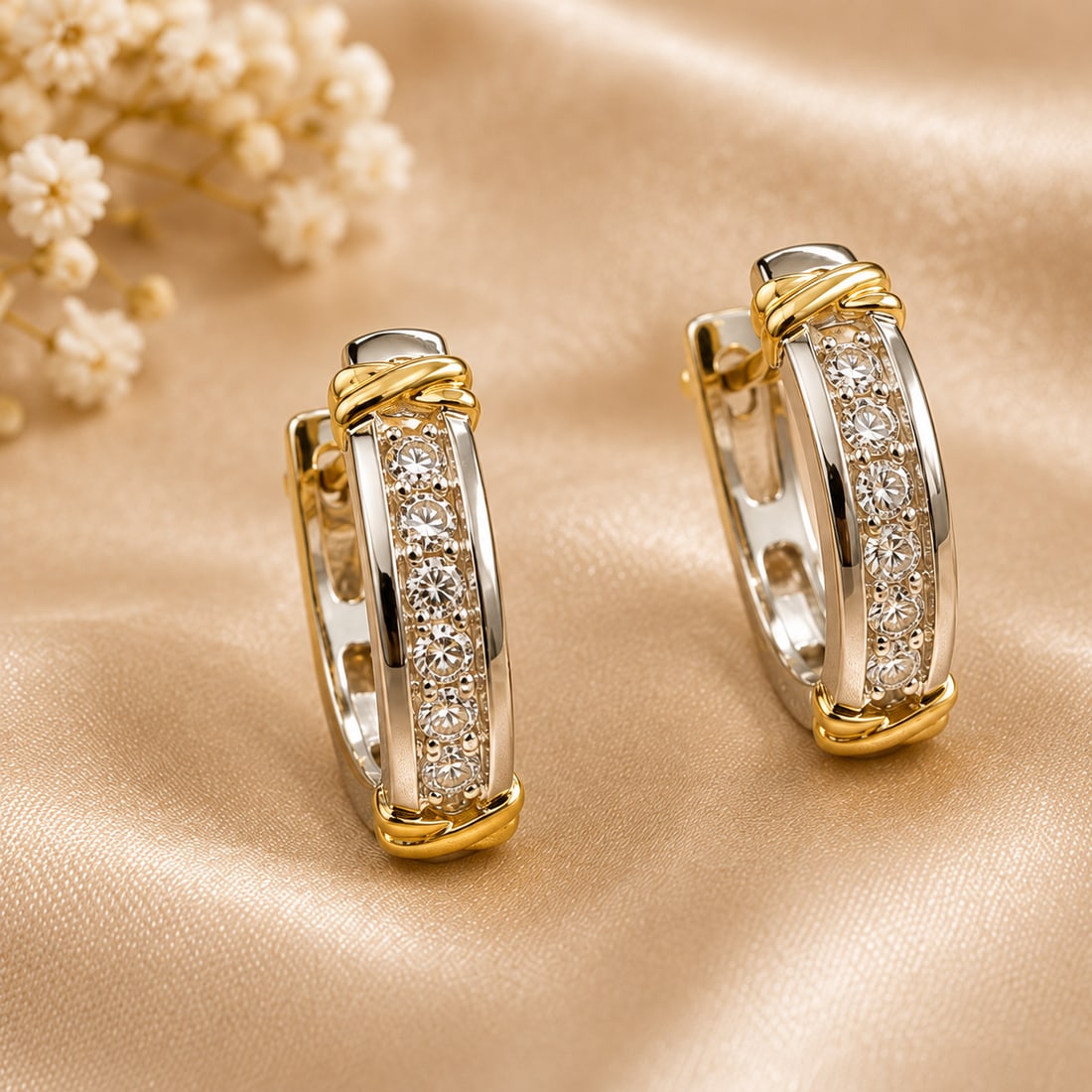 14K Two-Tone Gold Diamond Hoop Earrings with Appraisal: Elegant pair of 14K two-tone gold hoop earrings featuring rows of round diamond accents set across the front. Yellow gold detailing provides a contrasting finish against the white gold body, creating 