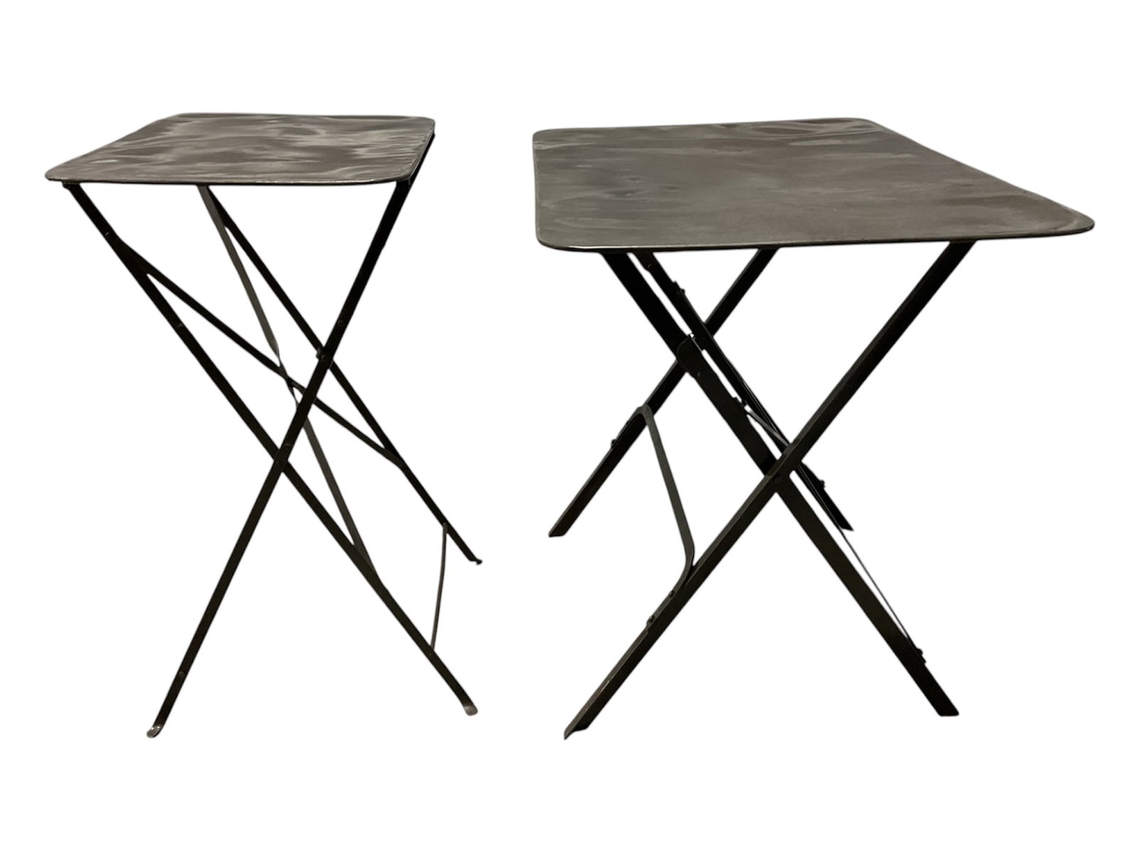 Pair of Vintage Industrial Metal Folding Tables: Pair of vintage industrial-style folding tables featuring rectangular metal tops with rounded corners and black painted steel folding bases. The tables exhibit a desirable utilitarian aesthetic with