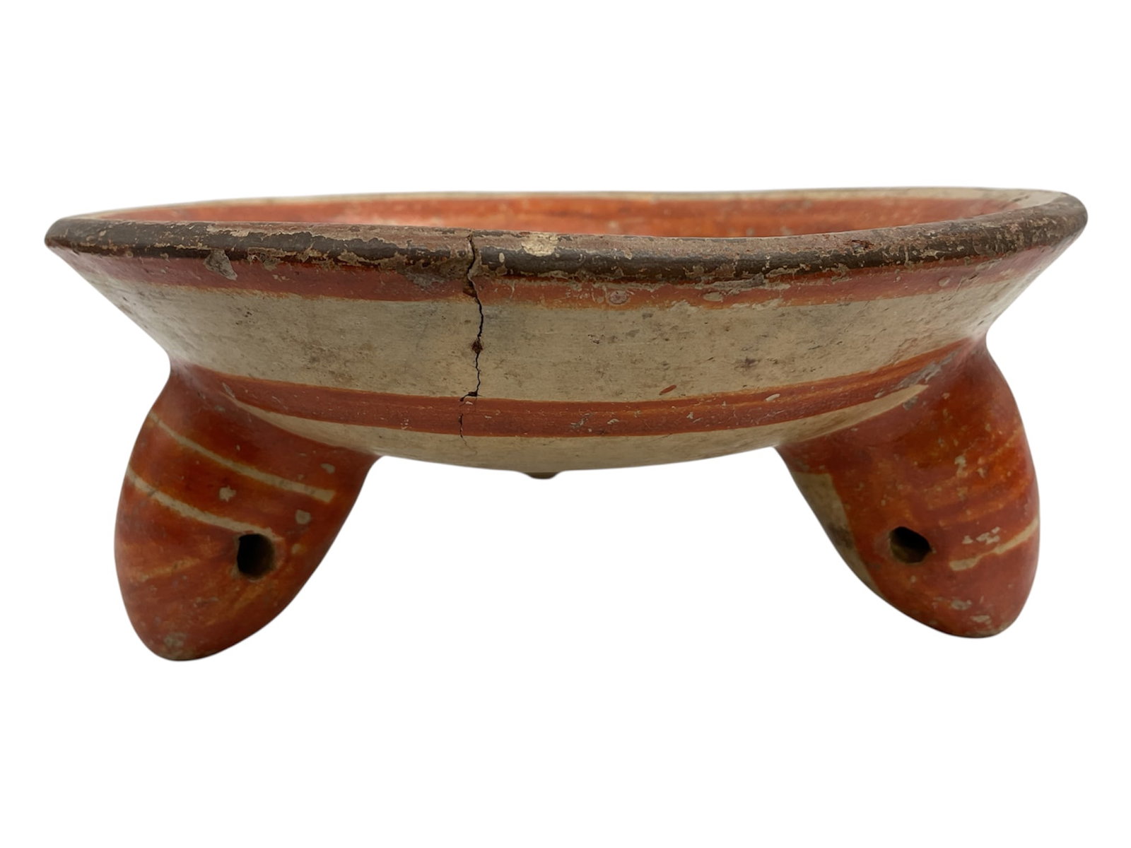 Pre-Columbian Polychrome Geometric Bowl, Central or South America, c. 500-1500 CE: Hand-coiled terracotta bowl featuring a wide, open form and a flat base. The exterior is decorated with a sophisticated polychrome slip, utilizing red, black, and cream pigments. The design is organiz