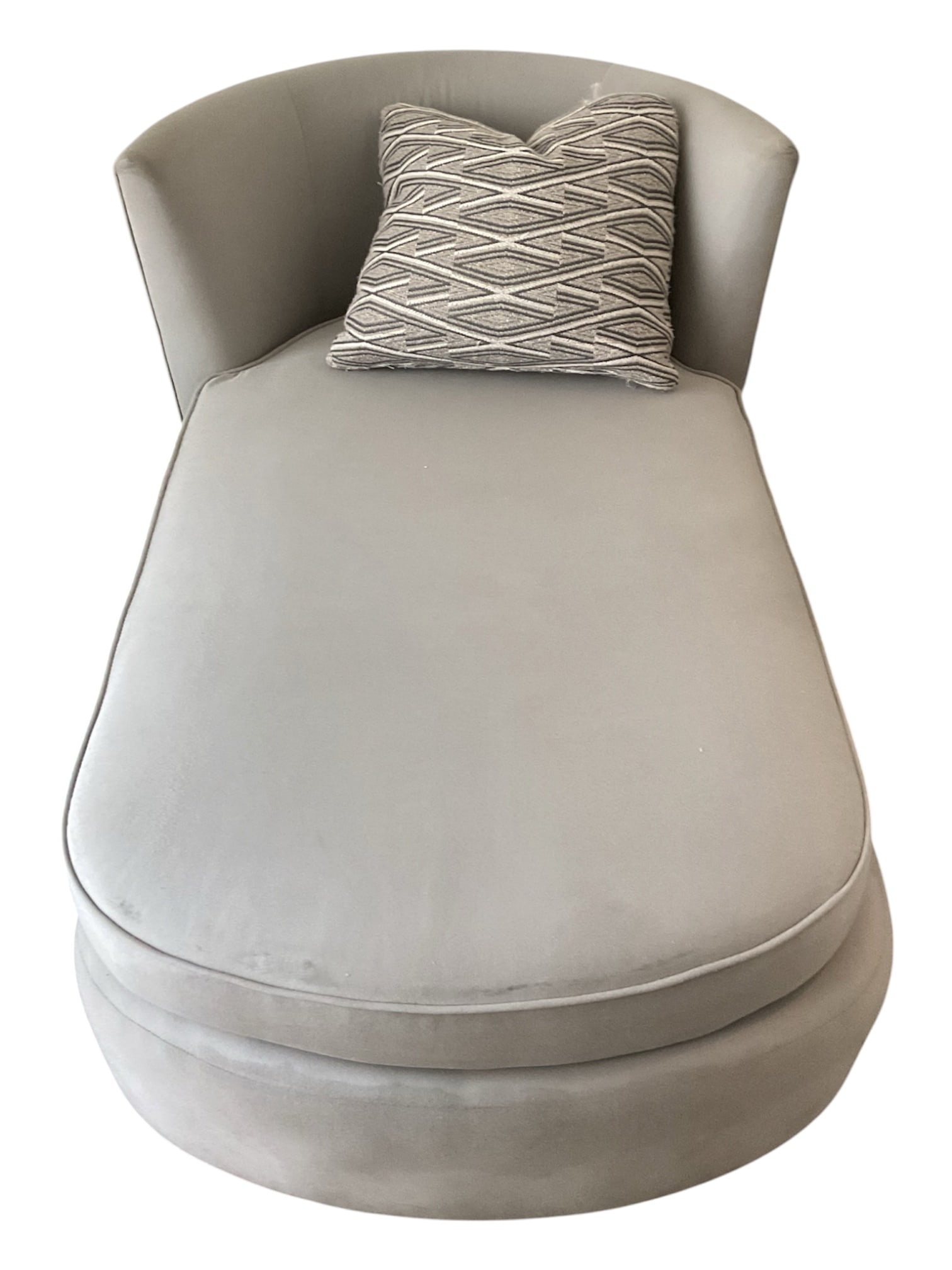Contemporary Curved Upholstered Chaise Lounge: A contemporary chaise lounge featuring a sculptural curved silhouette with a rounded upholstered base, generously padded seat cushion, and wraparound backrest. The streamlined, low-profile design is u