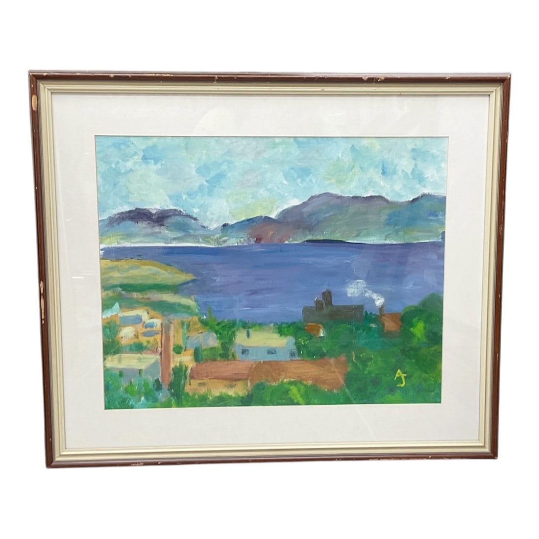 Framed Coastal Landscape Painting: Original landscape painting depicting a tranquil coastal scene with a deep blue body of water set before distant mountains and rolling hills. The foreground features stylized buildings, vegetation, an