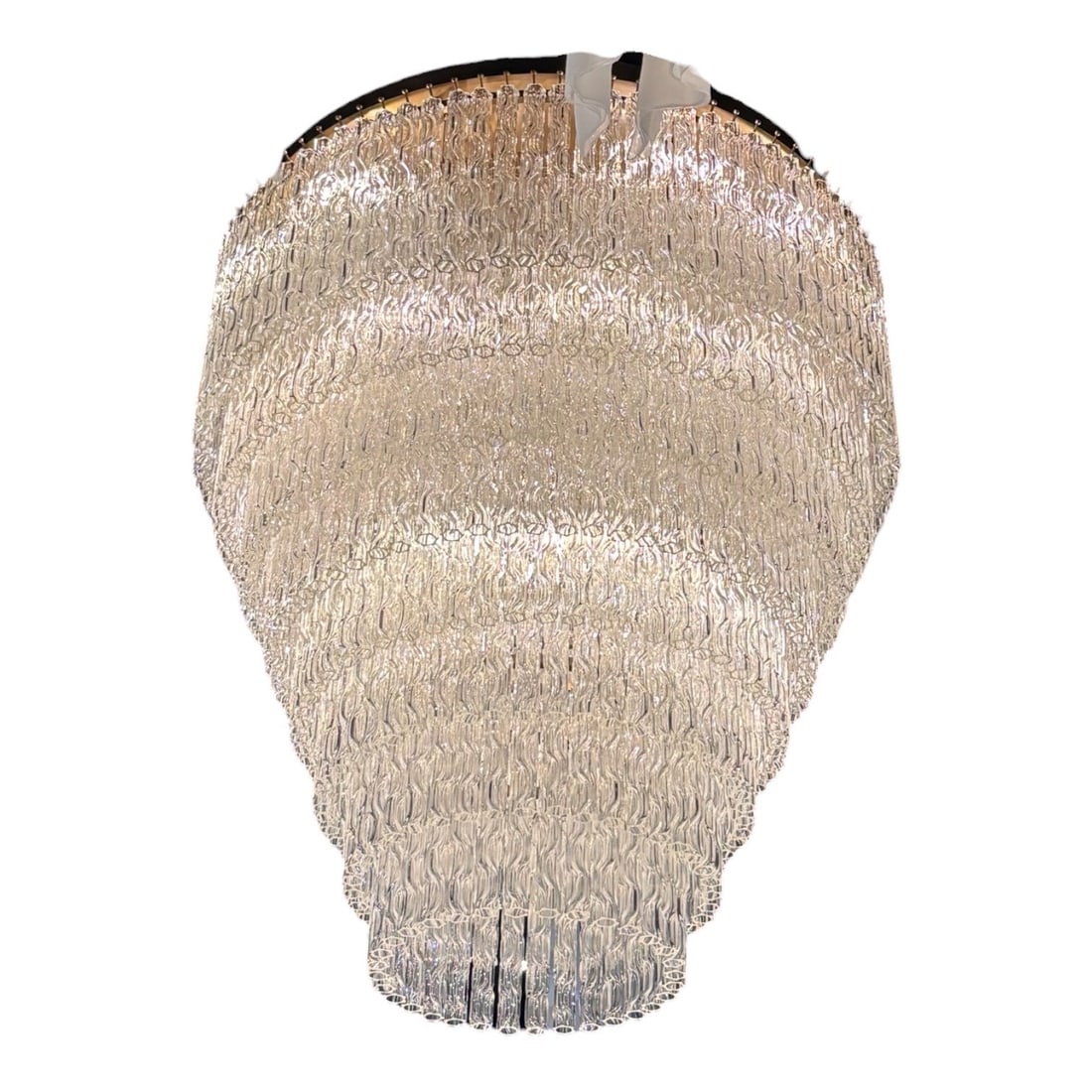 RARE Murano Tiered Water Grain Glass Tube and Antique Brass Waterfall Chandelier: A grand luxury multi-tier cascading waterfall chandelier featuring structured rows of textured, patterned glass tubes suspended from a brass frame in a dramatic tapered silhouette. SPECIFICATIONS