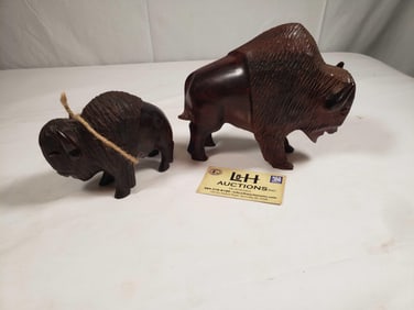 2- Carved Ironwood Buffalo