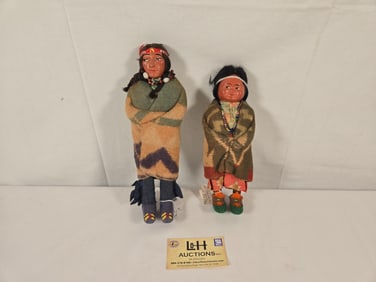2 Skookum dolls - 12" Skookum man w/tears in rear ofÊ moccasins & 10" Skookum girl w/replaced
